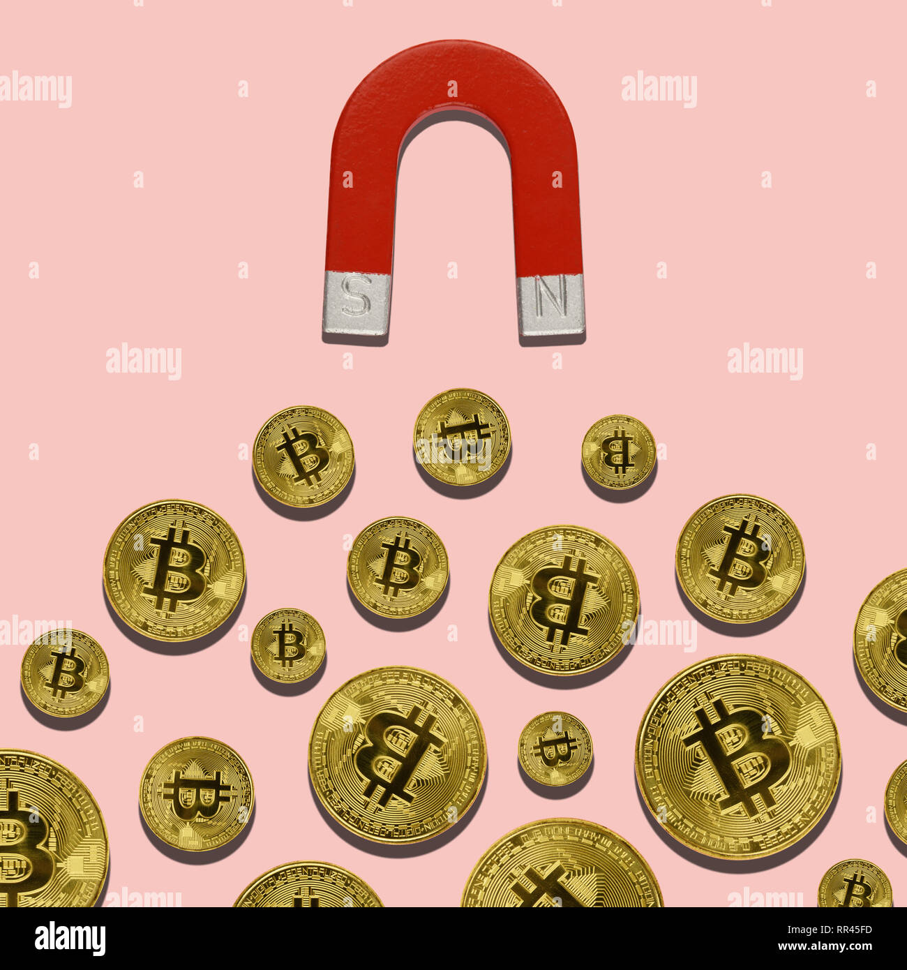 Bitcoin e attrarre il magnete. Il concetto di data mining Foto Stock
