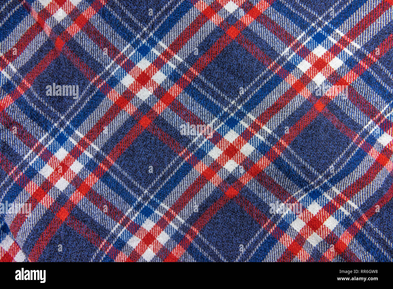 Abstract Texture di sfondo di un blu, bianco e rosso Plaid Hipster Shirt Pattern Foto Stock