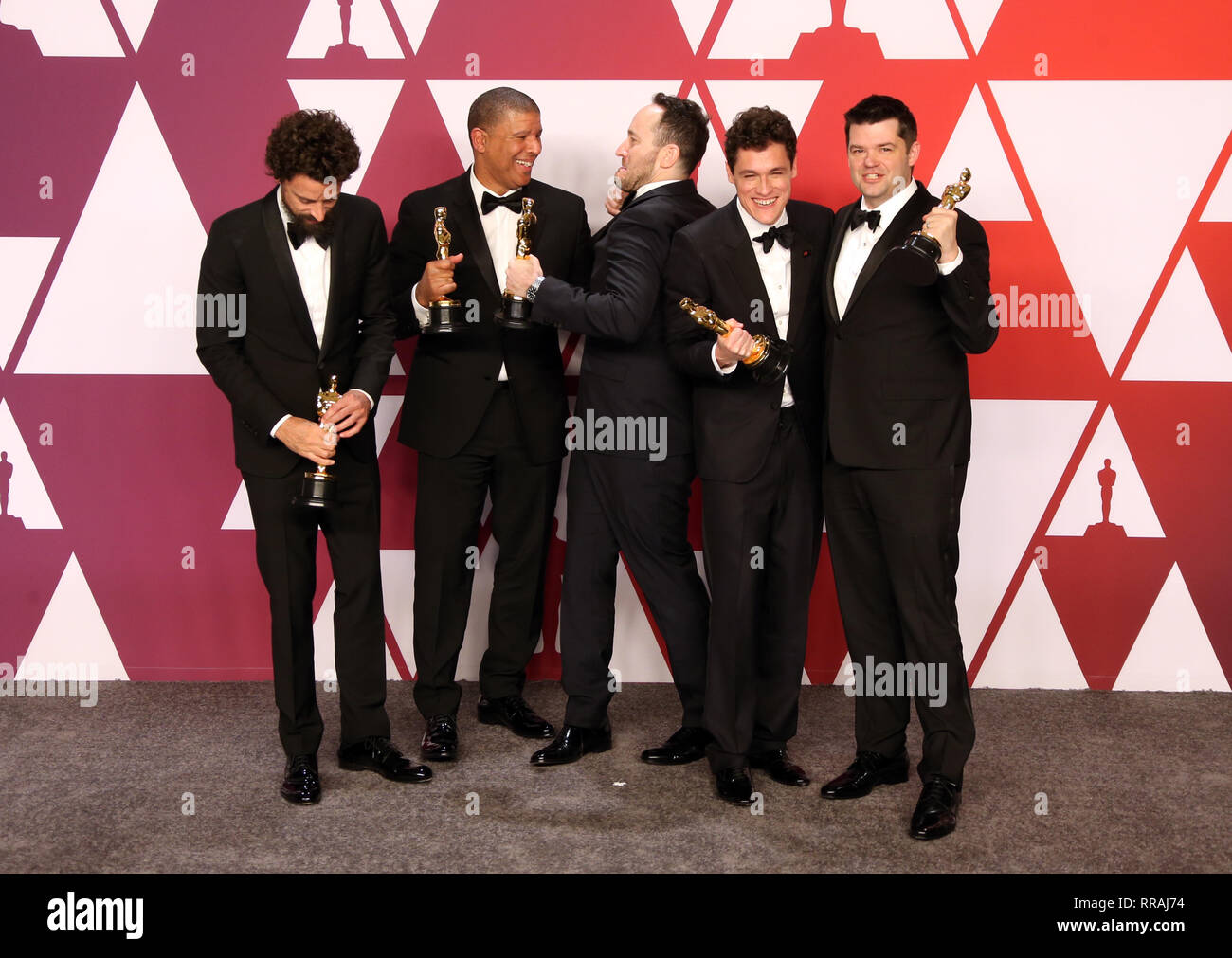 HOLLYWOOD, CALIFORNIA - 24 febbraio: Bob Persichetti, Peter Ramsey, Rodney Rothman, Phil signore, Christopher Miller, al 91annuale di Academy Awards Press Room a Hollywood e Highland il 24 febbraio 2019 a Hollywood, California..Credit: Faye Sadou/MediaPunch Foto Stock