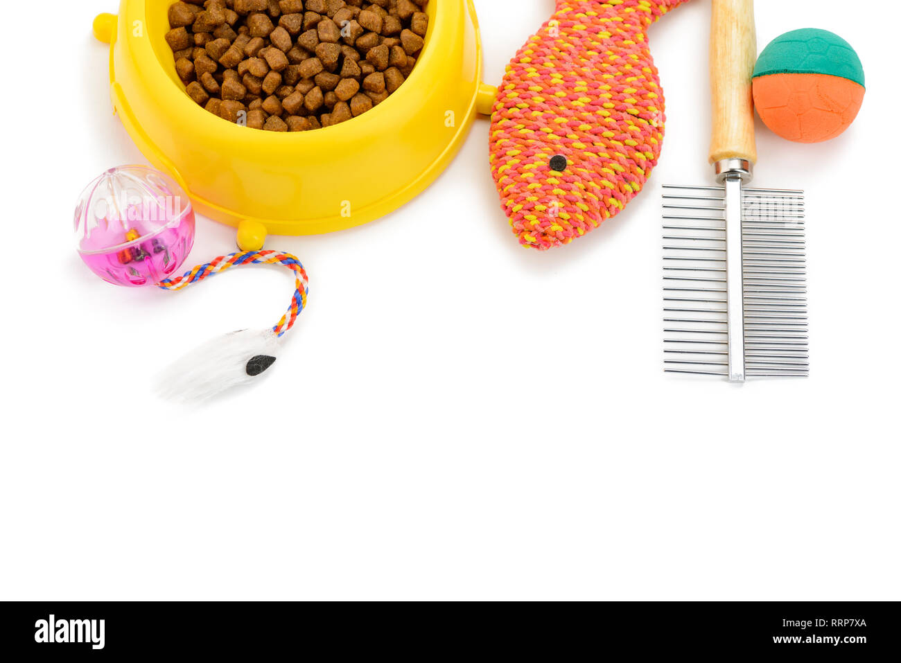 Giocattoli, cibo e spazzola Foto Stock