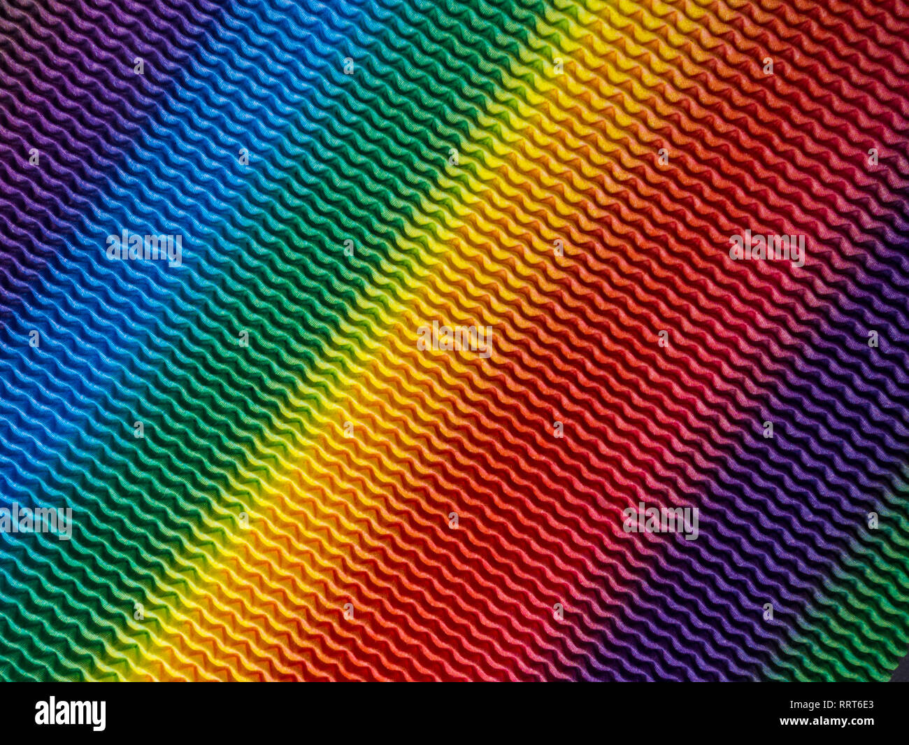 Rainbow linee ondulate sullo sfondo colorato Foto Stock