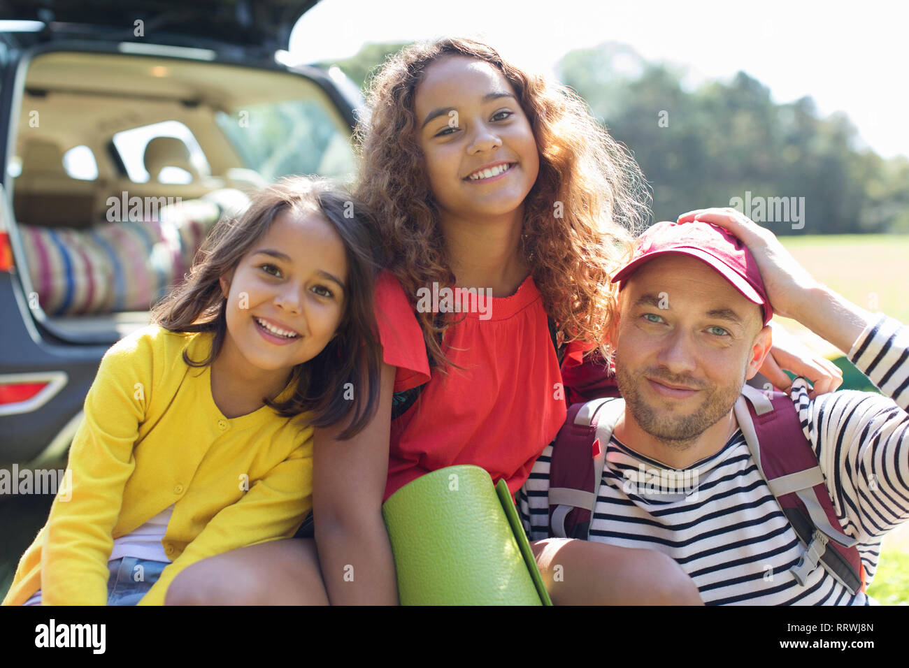 Ritratto di padre Felice e figlie Foto Stock