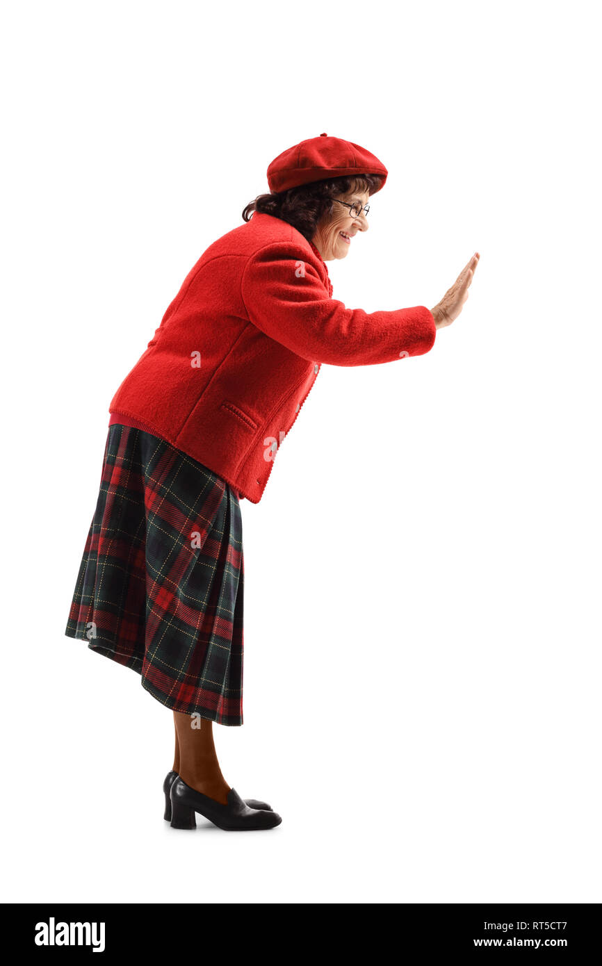 A piena lunghezza shot di una donna senior gesticulating alta cinque con mano isolati su sfondo bianco Foto Stock