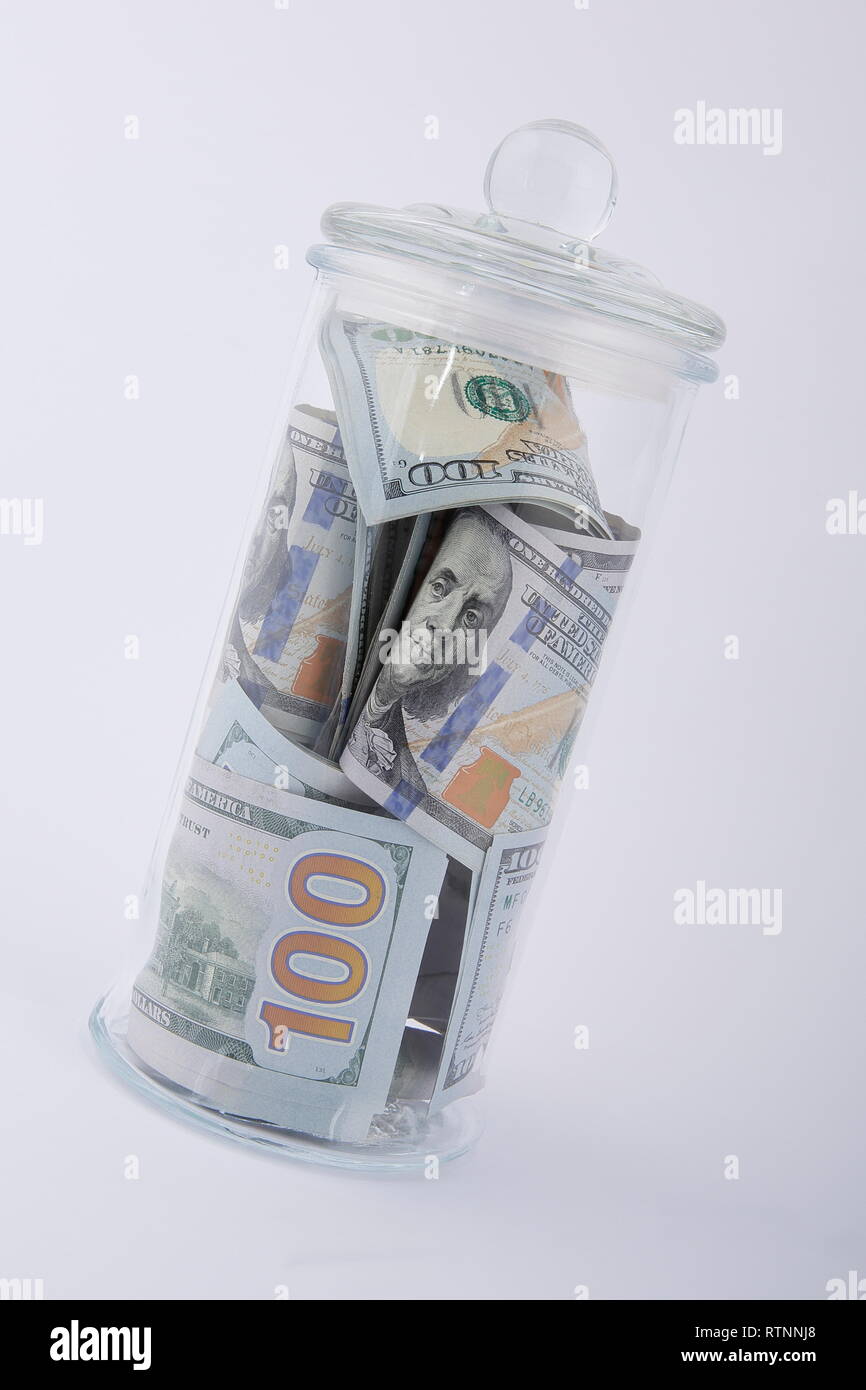 Composizione di dollari americani in un barattolo di vetro. Foto Stock