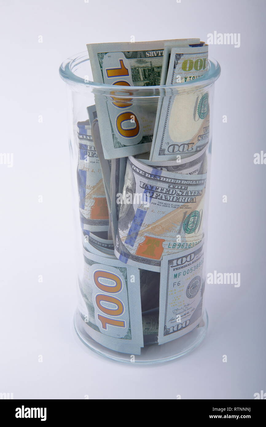 Composizione di dollari americani in un barattolo di vetro. Foto Stock