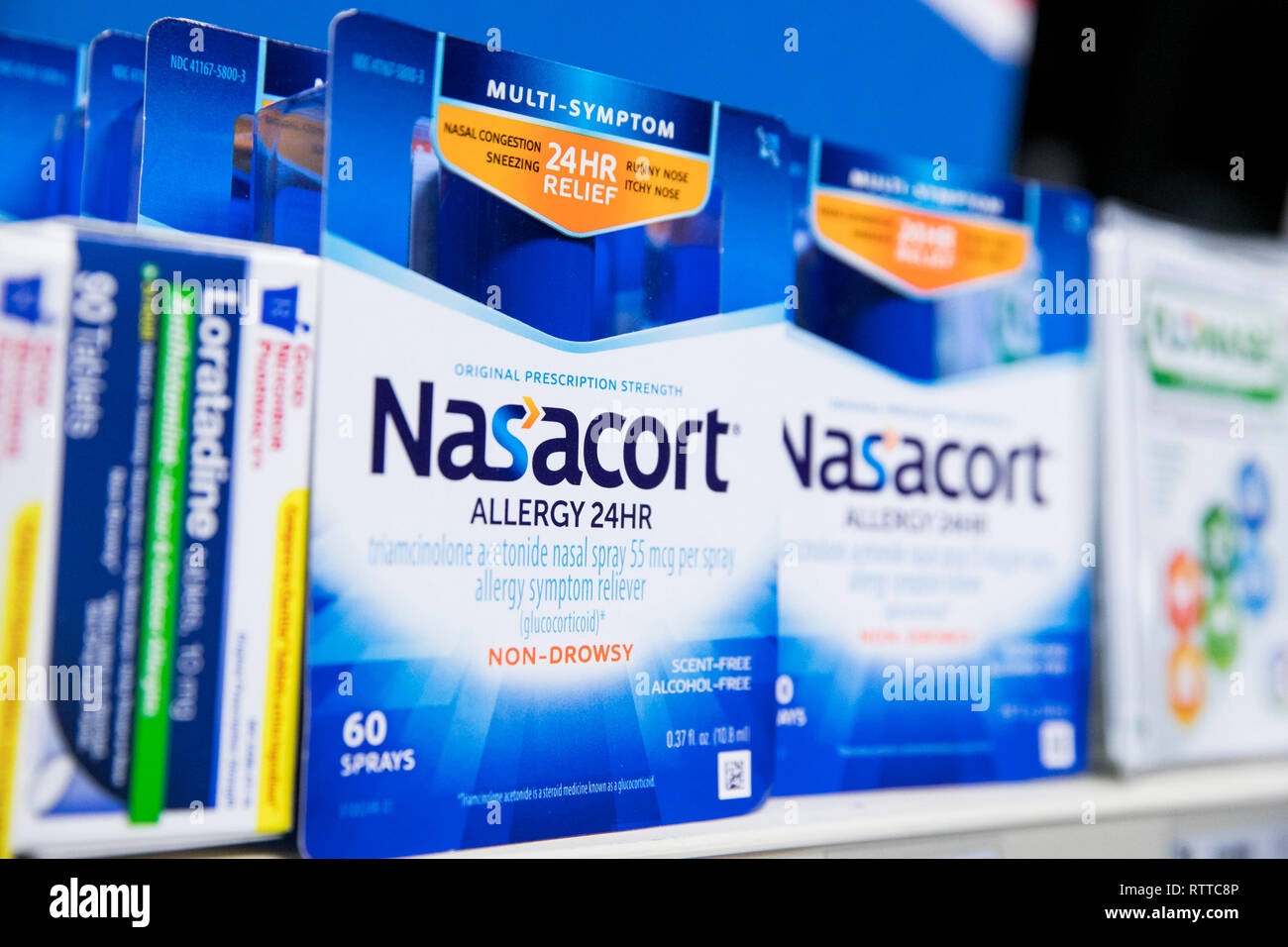 Nasacort e allergia Flonase over-the-counter medicina fotografato in una farmacia. Foto Stock