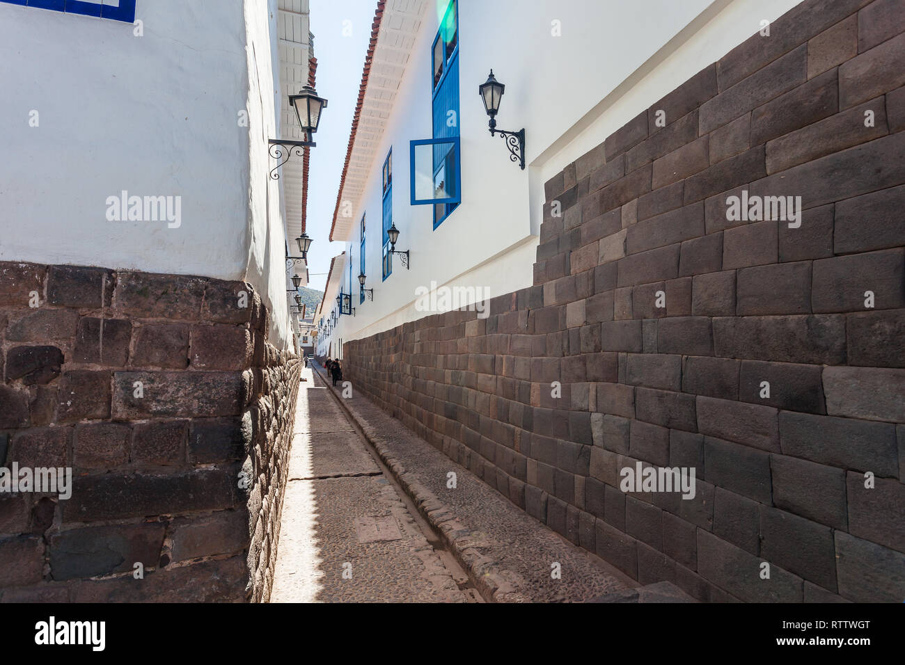 Mura Inca nelle strade di Cusco, pietre scolpite per un perfetto montaggio Foto Stock