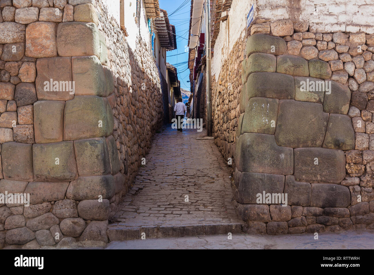 Mura Inca nelle strade di Cusco, pietre scolpite per un perfetto montaggio Foto Stock