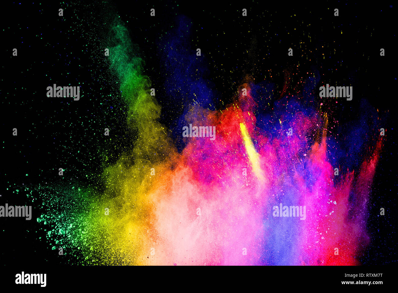 Polvere multicolore esplosione su sfondo bianco.Abstract colorati di particelle di polvere textured background. Foto Stock