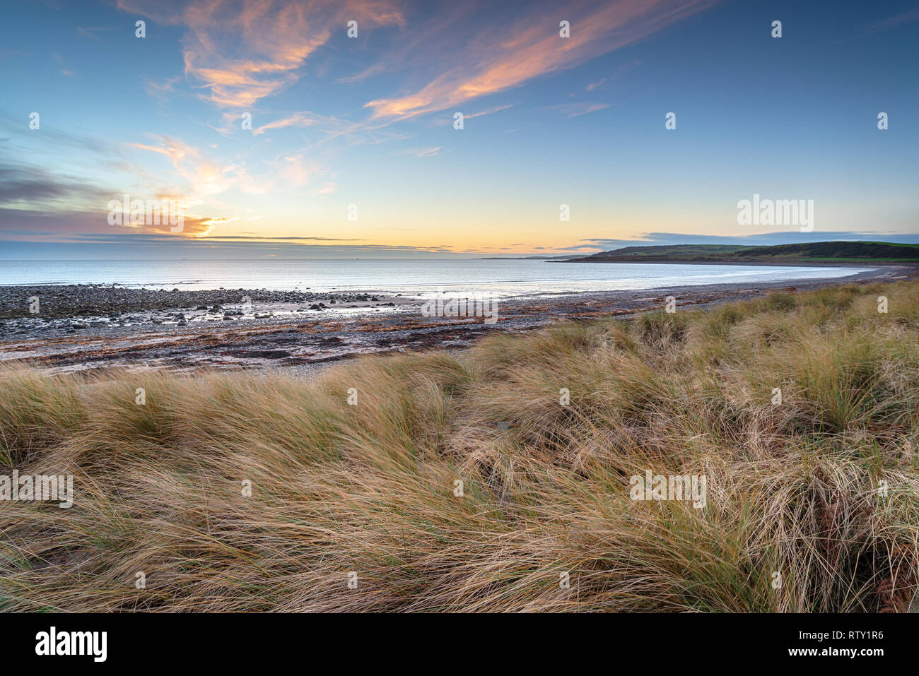 Sunrise over New England Bay a Kirkmaiden sulla costa di Galloway in Scozia Foto Stock