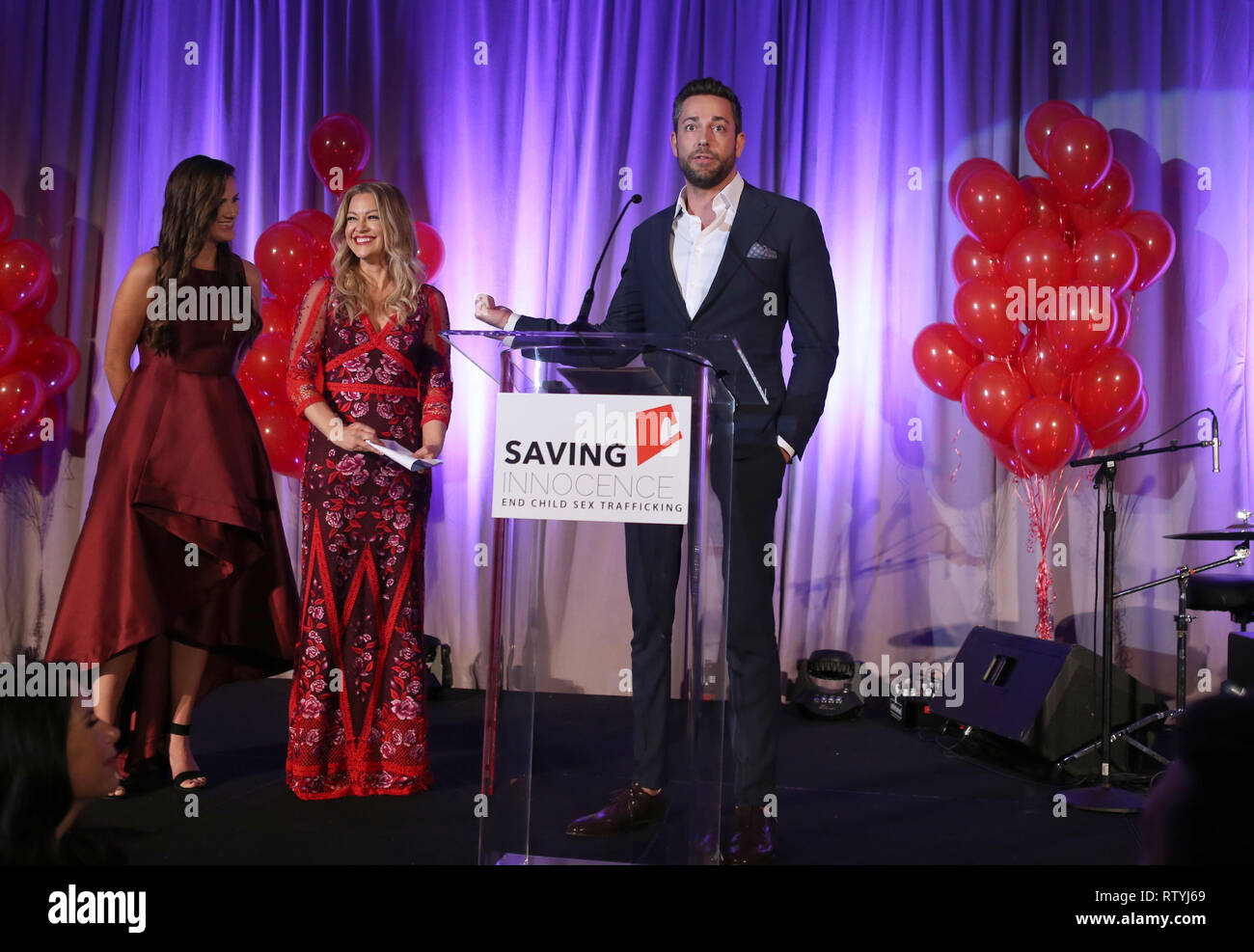 Hollywood, Stati Uniti d'America - 2 Marzo: Ambra Davies, Kim Biddle, Zachary Levi, al 7 risparmio annuale di Gala di innocenza al Loews Hollywood Hotel in Hollywood, USAlifornia il 2 marzo 2019. Credito: Faye Sadou/MediaPunch Foto Stock