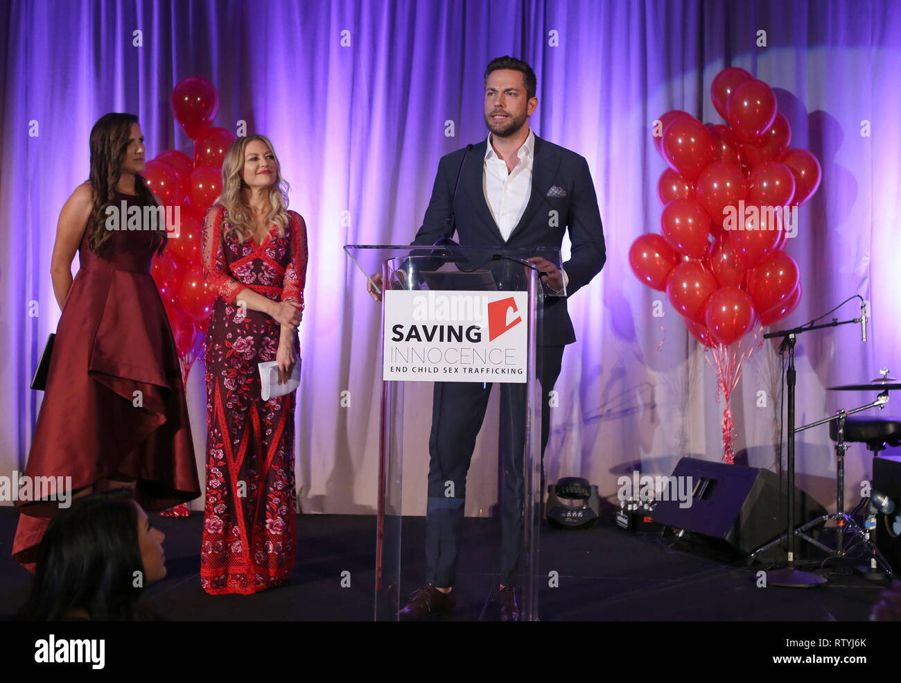 Hollywood, Stati Uniti d'America - 2 Marzo: Ambra Davies, Kim Biddle, Zachary Levi, al 7 risparmio annuale di Gala di innocenza al Loews Hollywood Hotel in Hollywood, USAlifornia il 2 marzo 2019. Credito: Faye Sadou/MediaPunch Foto Stock