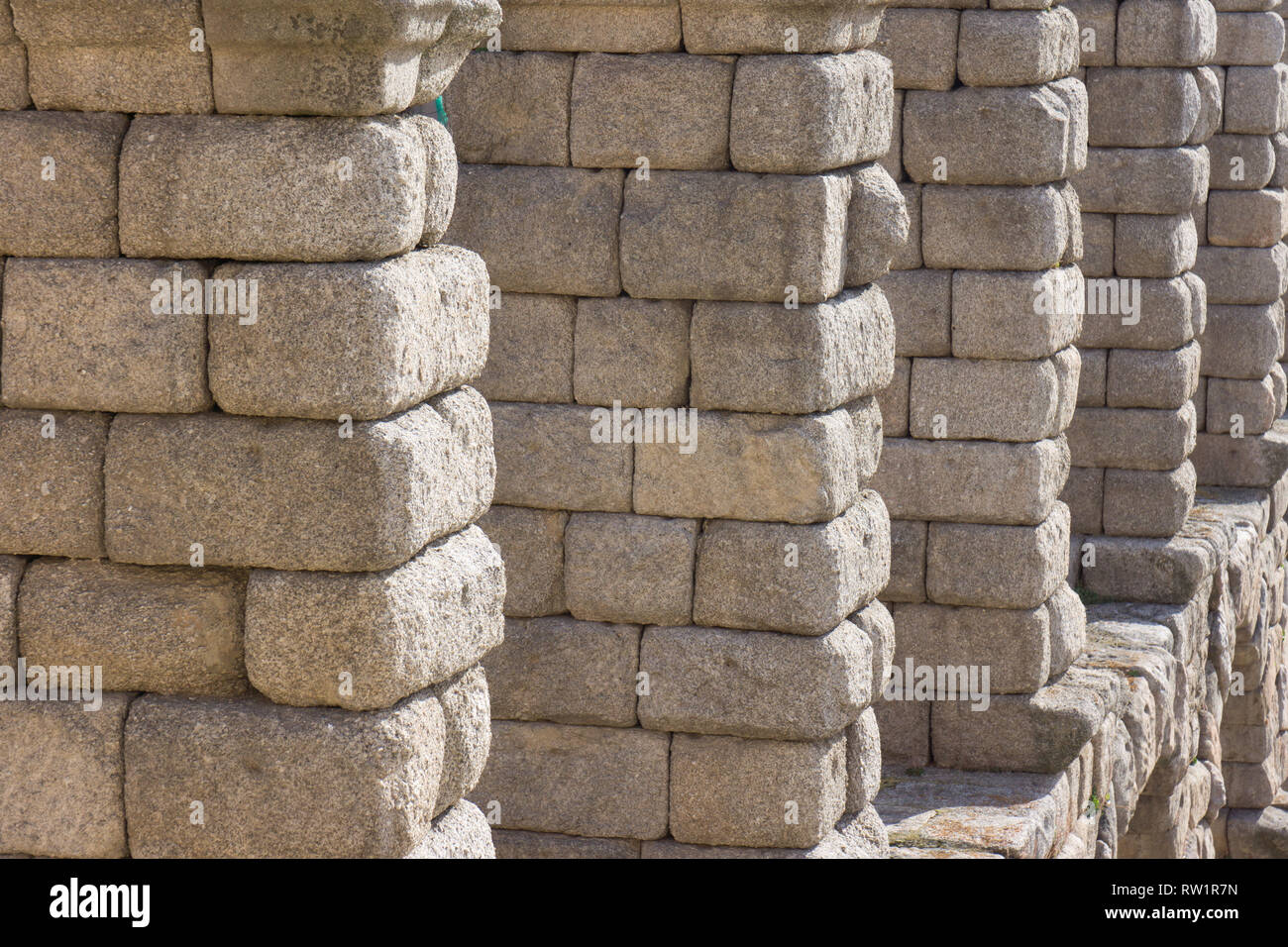 Dettaglio dell'Acquedotto di Segovia e il granito unmortared lavoro in pietra Foto Stock