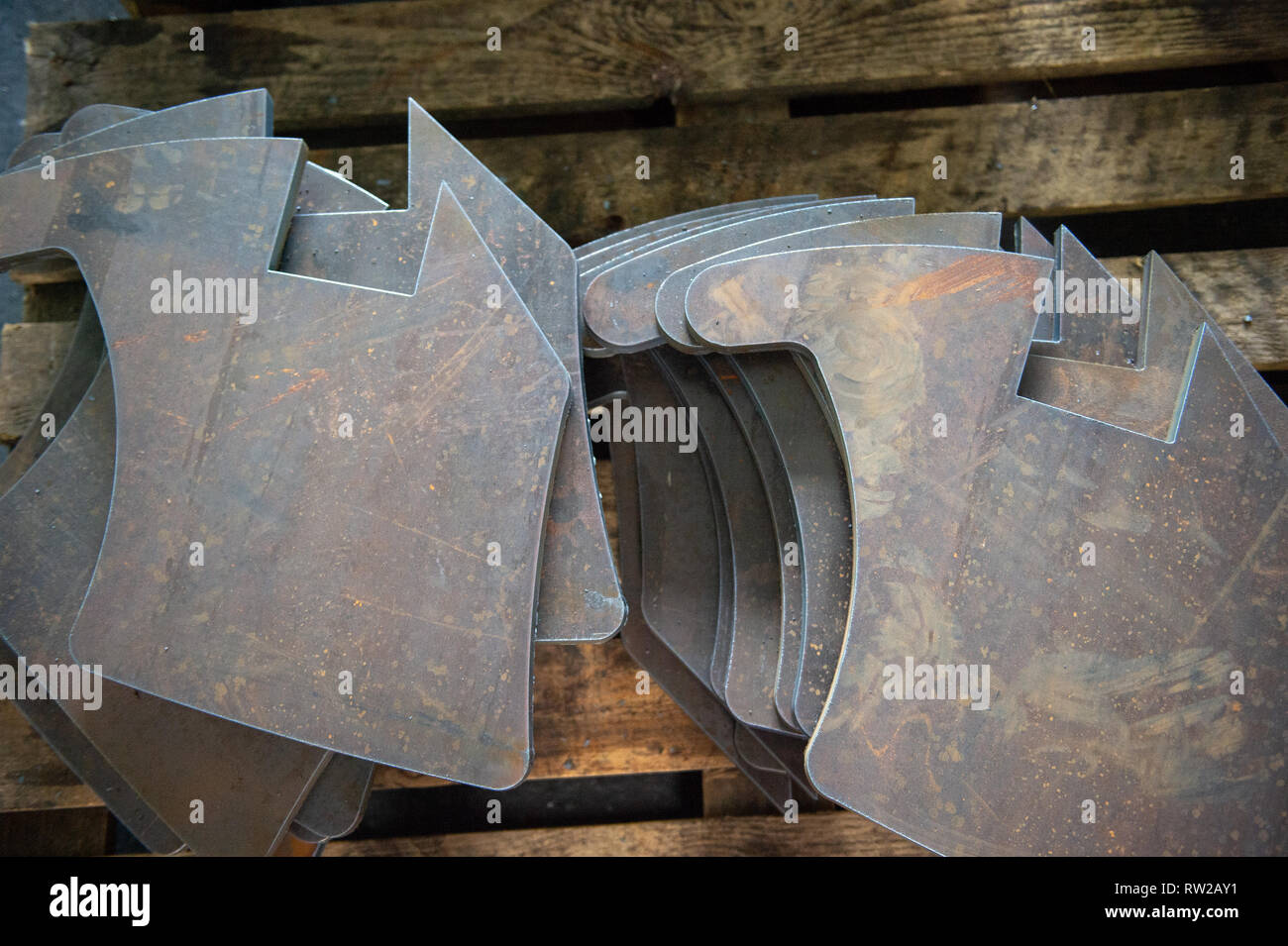 Pila di industriale pezzi metallici utilizzati per rendere i trattori, Kutno, Łódź voivodato, Polonia Foto Stock
