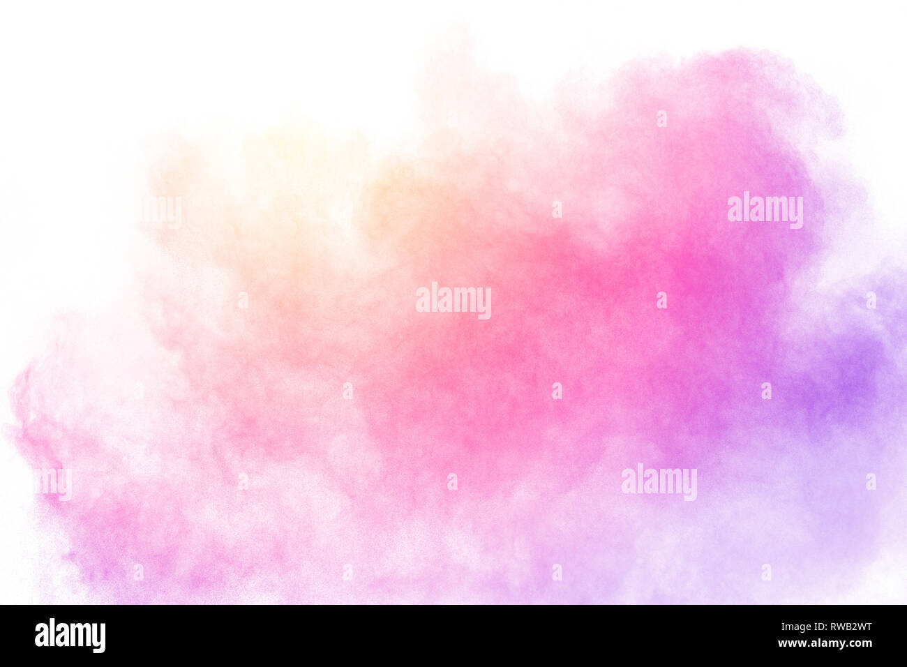 Particelle multicolori esplosione su sfondo bianco. La polvere colorata splatter su sfondo bianco. Foto Stock