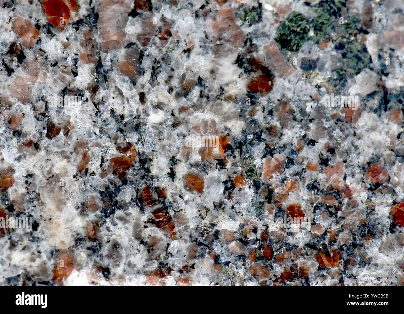 Il granito. Close-up della struttura. I cristalli (feldspato e quarzo, mica) chiaramente visibile Foto Stock