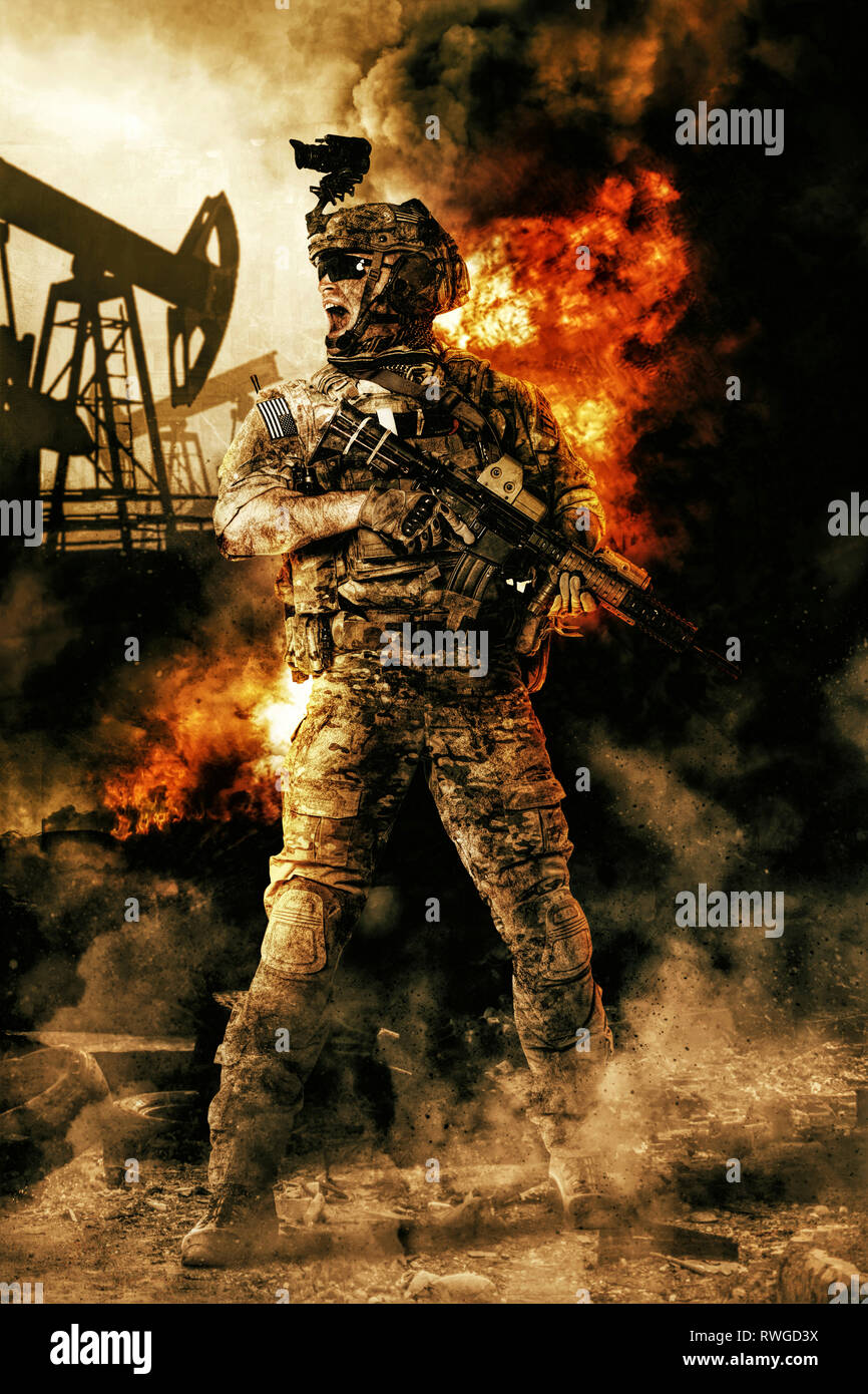 Soldato dell'esercito in azione. Grande esplosione con il fuoco e il fumo flutti. Oil Rig in background. Foto Stock