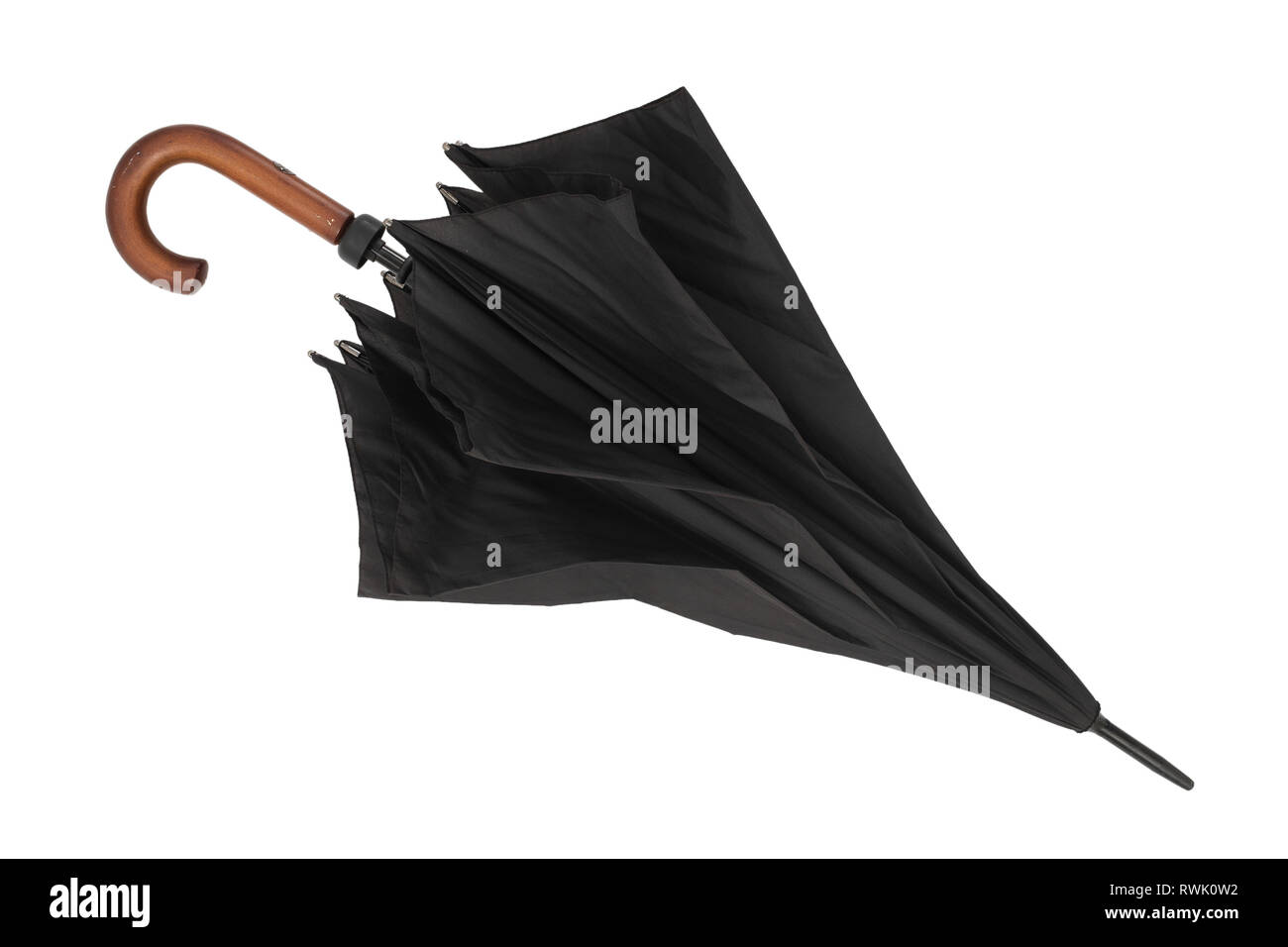 Parzialmente ombrello aperto su bianco Foto Stock