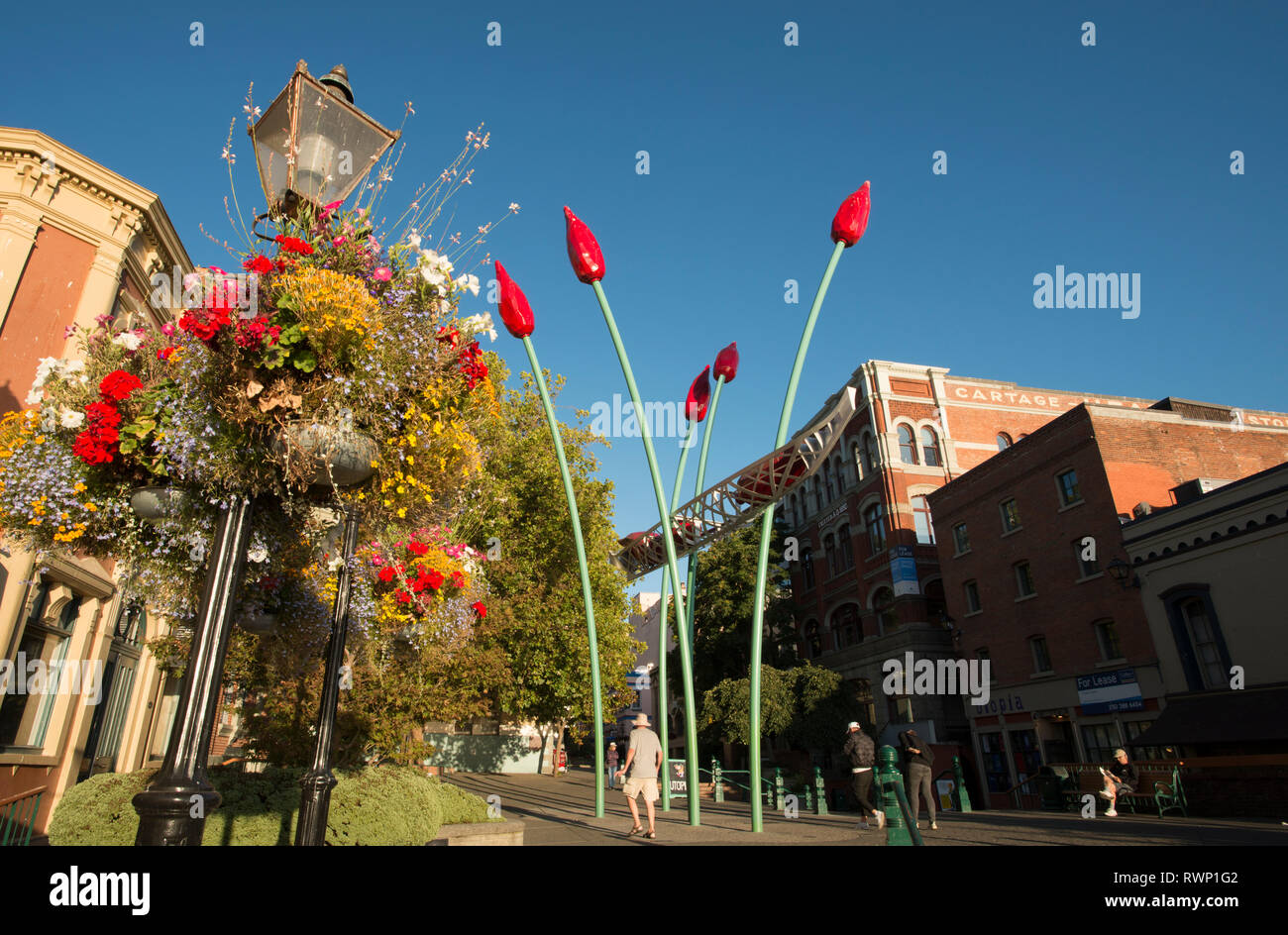 Commerce canoa, scultura, Bastion Square, Victoria, British Columbia, Canada Foto Stock