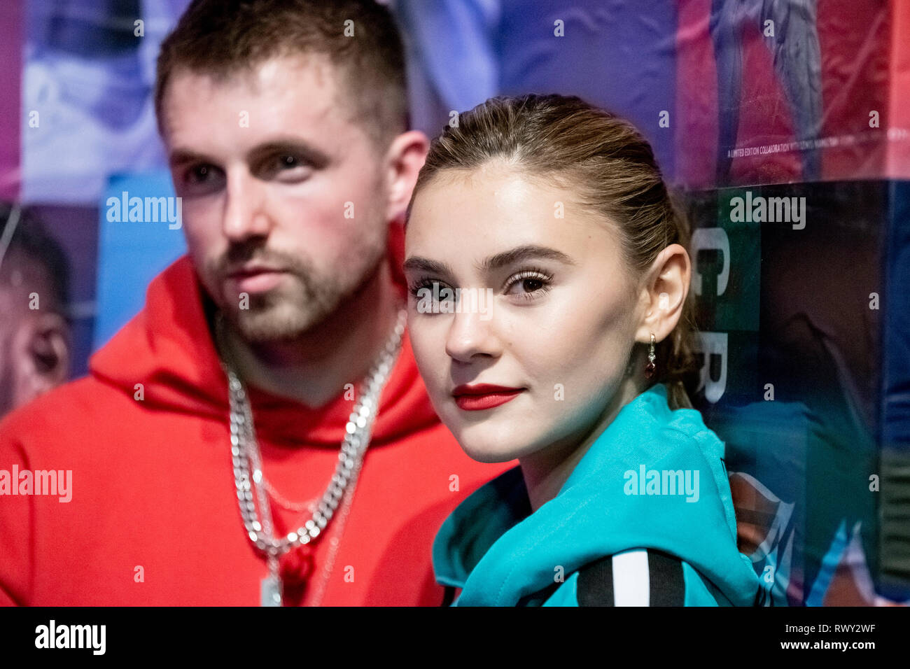 Berlino, Germania. 07Th Mar, 2019. Marcus Butler, influencer e Stefanie Giesinger, modello a stare di fronte ad una parete di foto a Tommy Hilfiger CREATExUNITY evento. Credito: Christoph Soeder/dpa/Alamy Live News Foto Stock