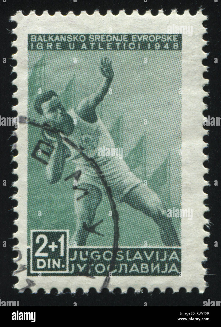 La RUSSIA KALININGRAD, 12 novembre 2016: timbro stampato dalla Iugoslavia, mostra un uomo che fa shotput, 1948 circa Foto Stock