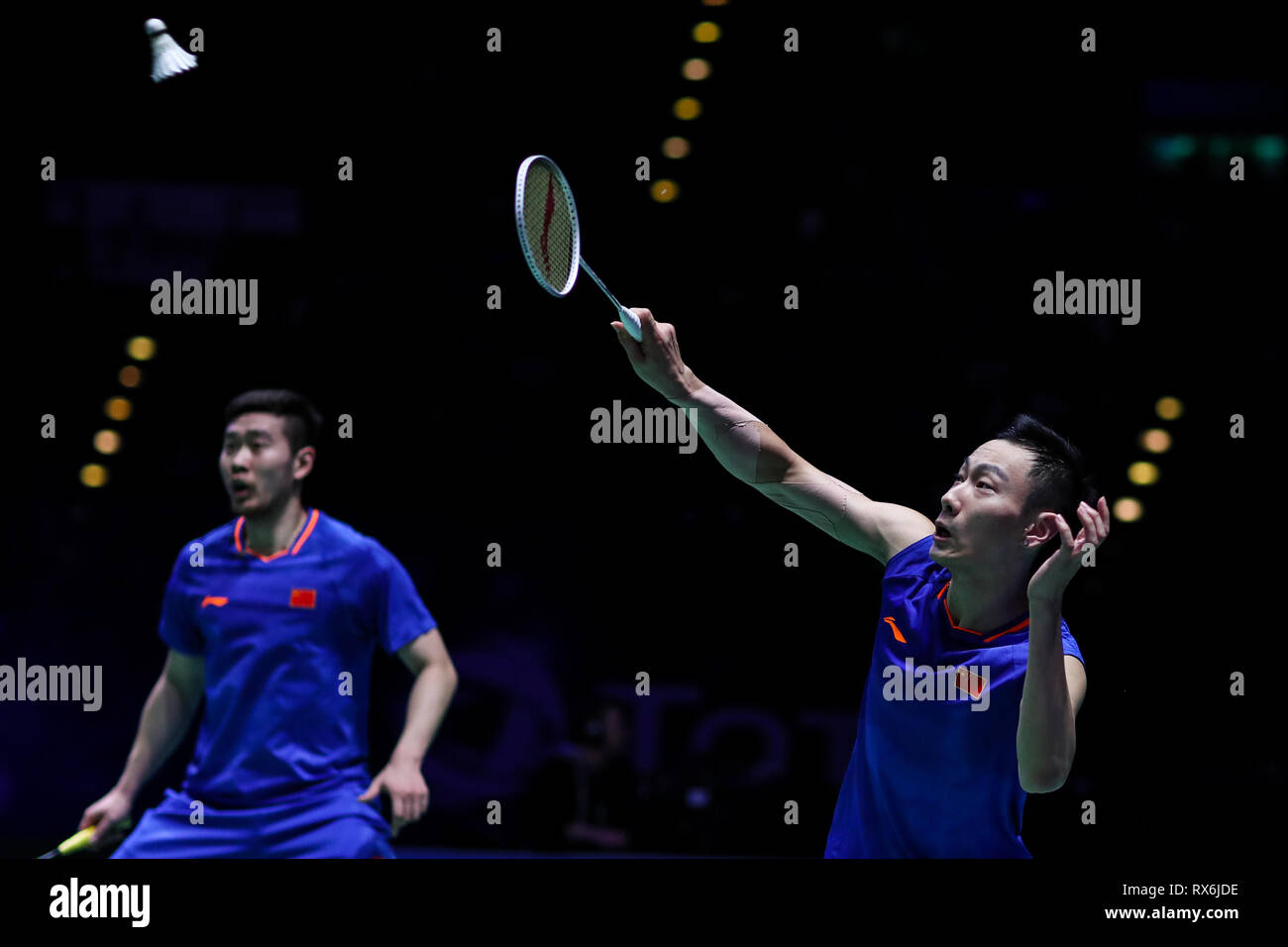 Birmingham. 8 Mar, 2019. Della Cina di Liu Cheng/Zhang Nan (R) competere durante gli Uomini Doppio Quarti di finale corrisponde con la Malaysia ha Aaron Chia e Soh Wooi Yik a All England Open Badminton Championships 2019 a Birmingham, la Gran Bretagna il 8 marzo 2019. Credito: Tang Shi/Xinhua/Alamy Live News Foto Stock