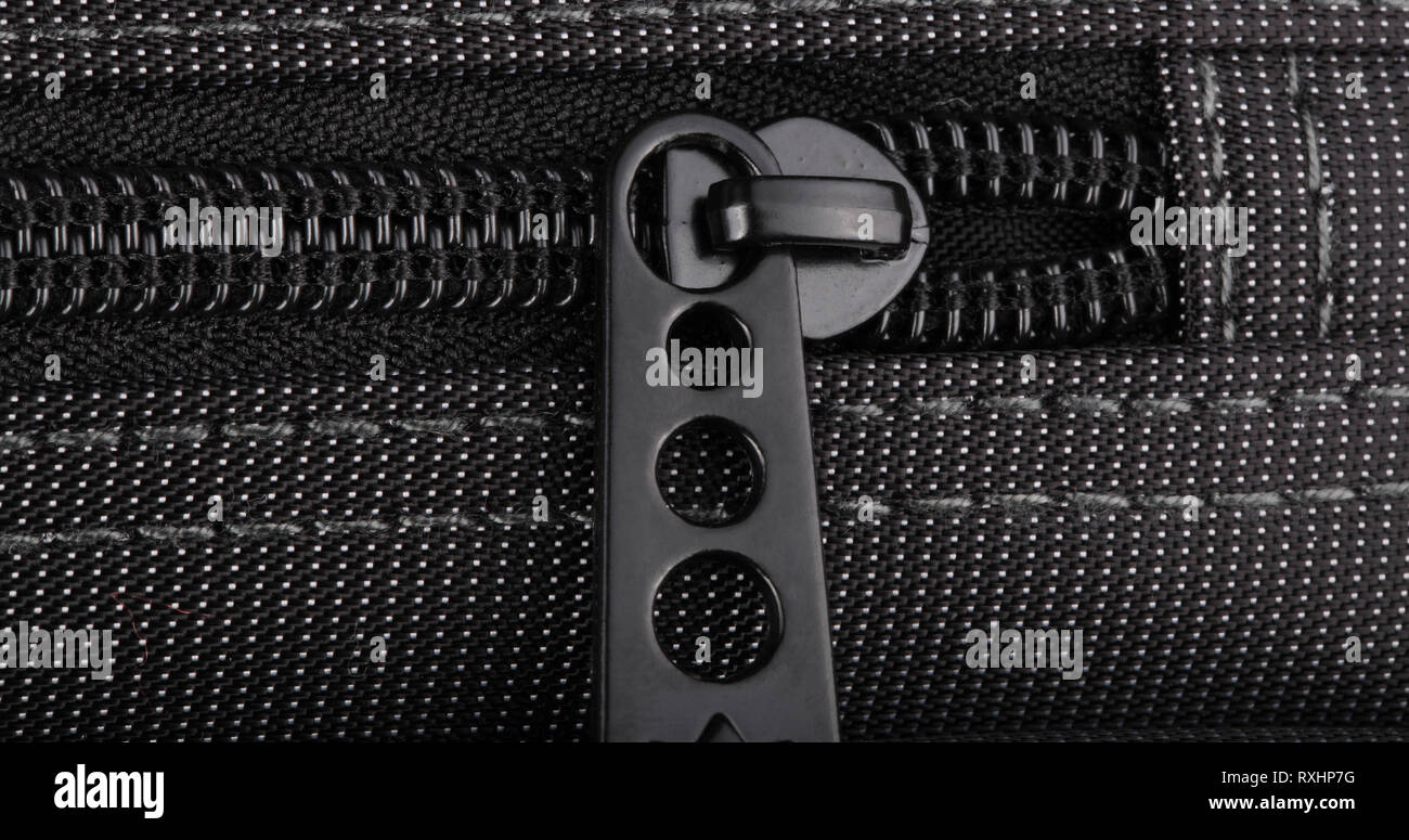 Borsa nera con puntini bianchi Foto Stock