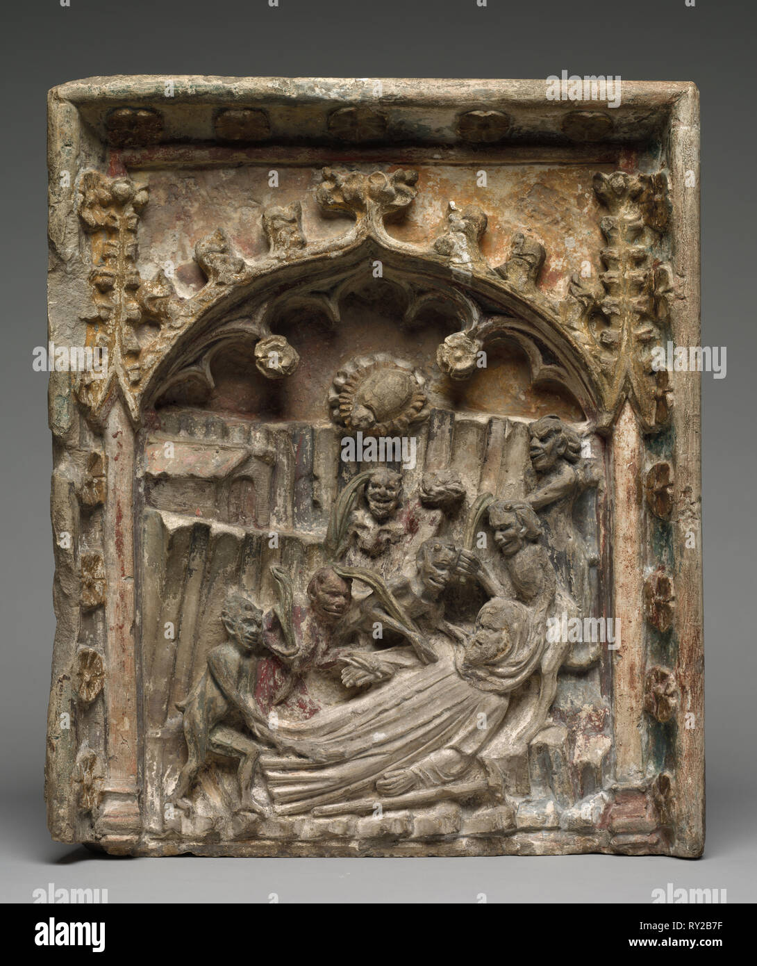 La Tentazione di Sant Antonio di Egitto, c. 1400s. Francia, c. Xv secolo. Pietra; complessivo: 46,4 x 38,6 cm (18 1/4 x 15 3/16 in Foto Stock