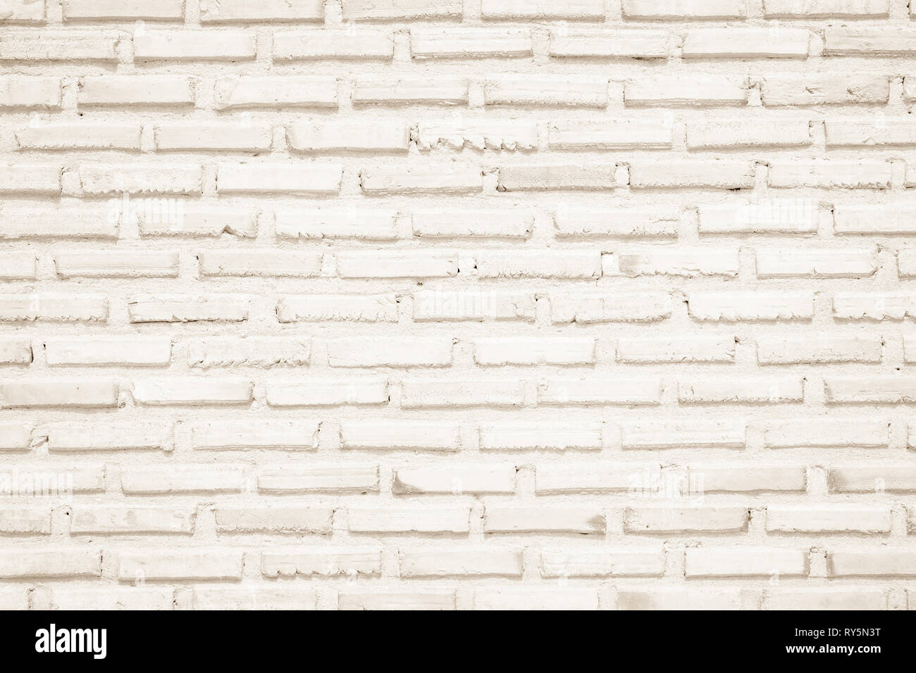 Colori crema e bianco muro di mattoni arte calcestruzzo o pietra texture di sfondo carta da parati in astratto di calcare la vernice per pavimenti e i compiti di scuola/muratura o Foto Stock