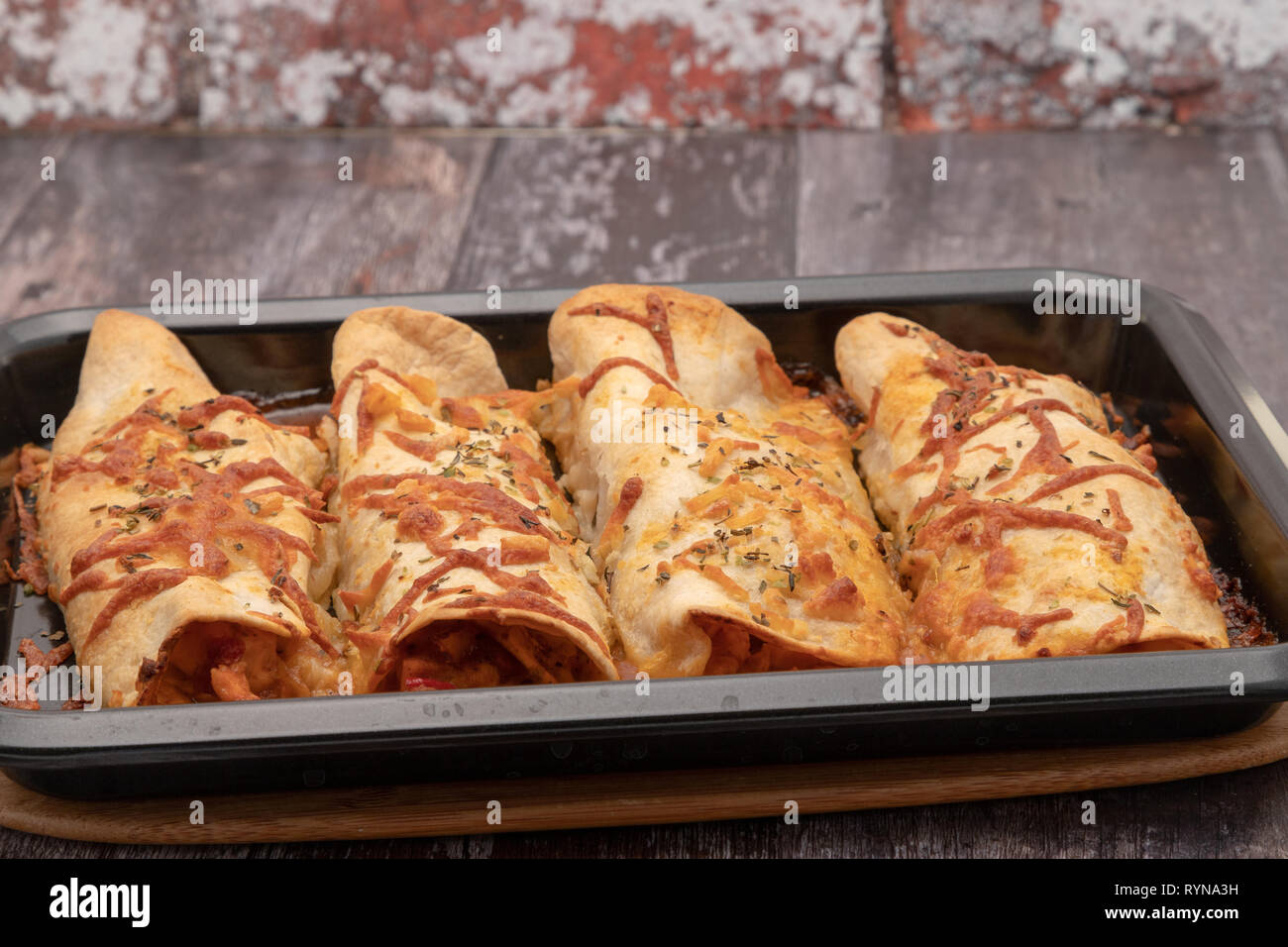 Enchiladas di pollo Foto Stock