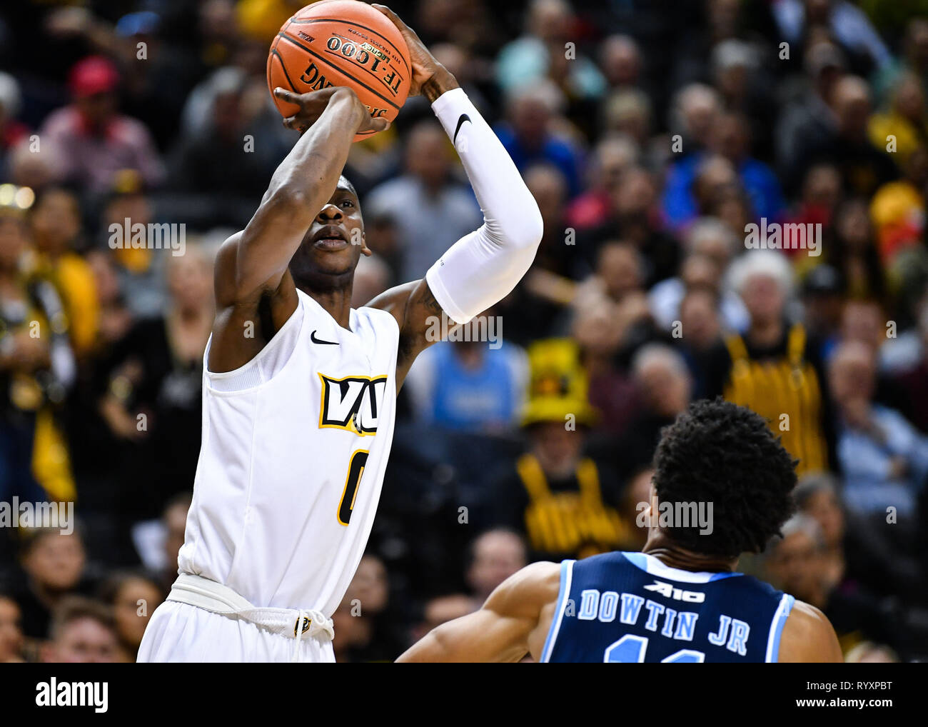 Brooklyn, New York, Stati Uniti d'America. Xv Mar, 2019. Virginia Commonwealth guardia Rams de'RIANTE JENKINS (0) spara tre punto cestello durante il primo semestre contro il Rhode Island Rams presso Barclays Center Credito: Terrence Williams/ZUMA filo/Alamy Live News Foto Stock