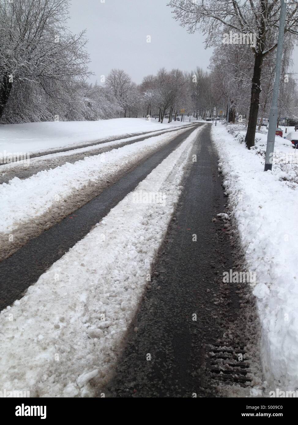 Neve e ghiaccio sulle strade Foto Stock