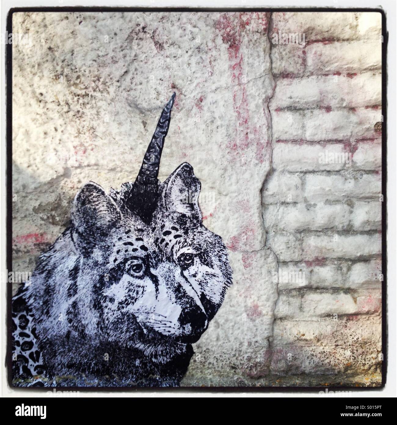 Un animale fantastico, mix di un lupo e un unicorno, decora una parete a Colonia Roma, Città del Messico, Messico Foto Stock