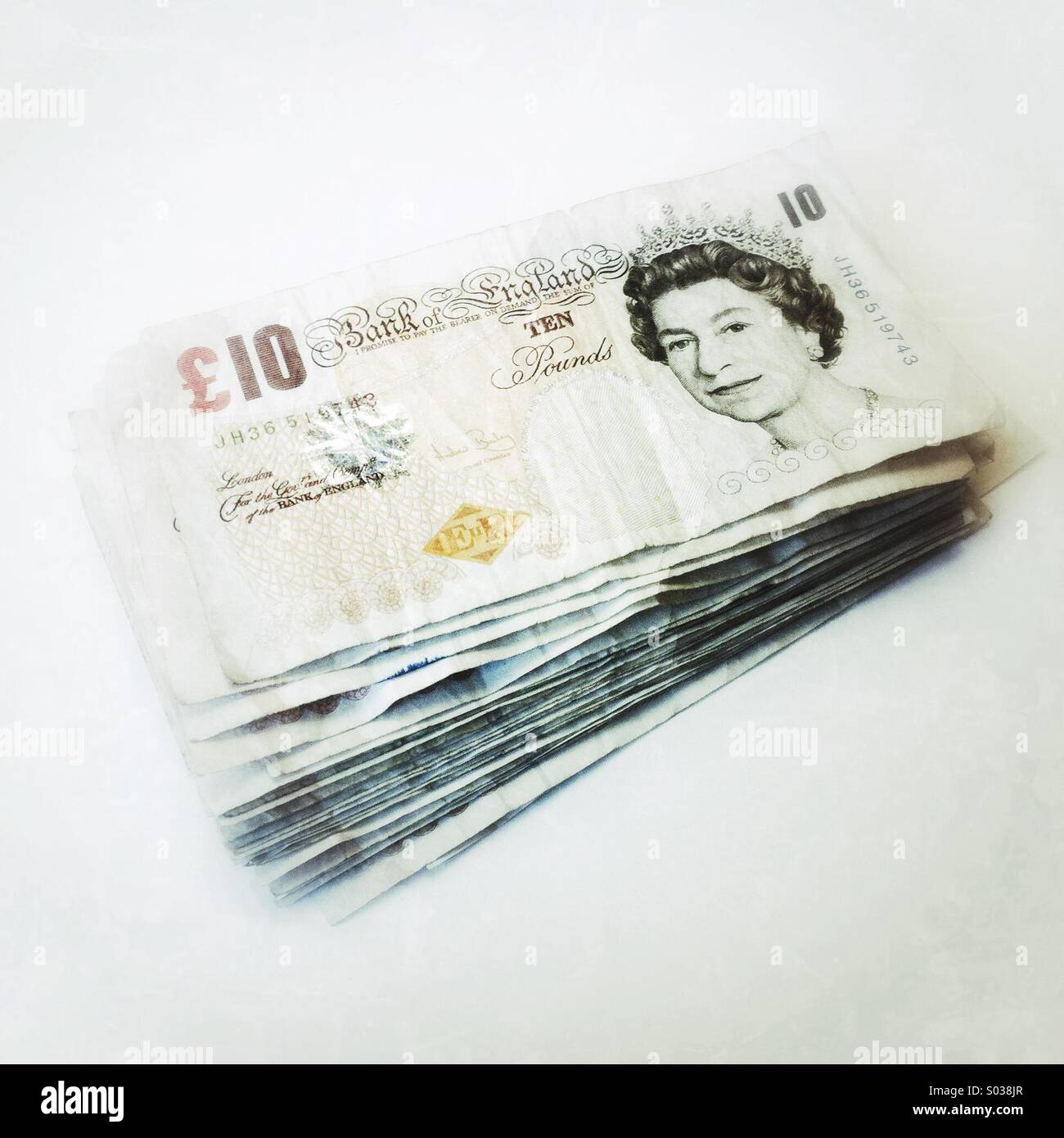 Pila di dieci pound note - Immagine stock catturata con smartphone