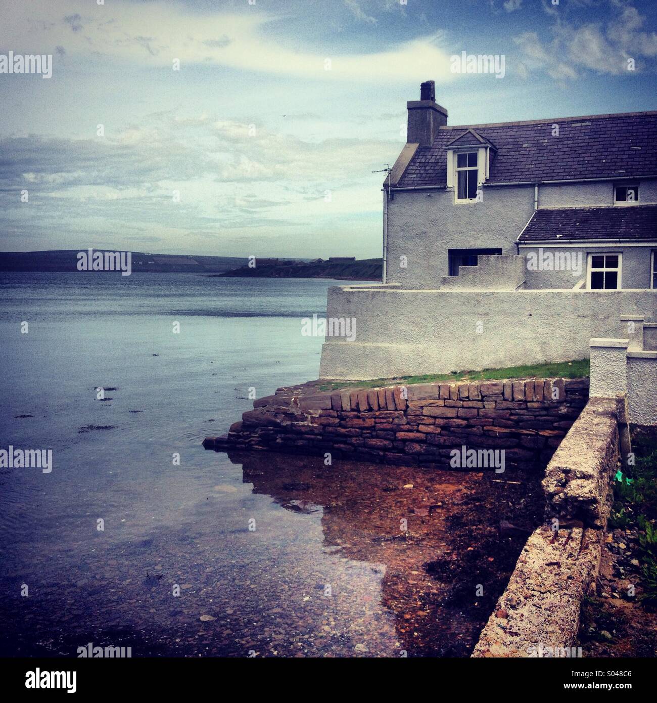 Harbourside cottage in St. Margaret's speranza, isole Orcadi, Scozia. Foto Stock