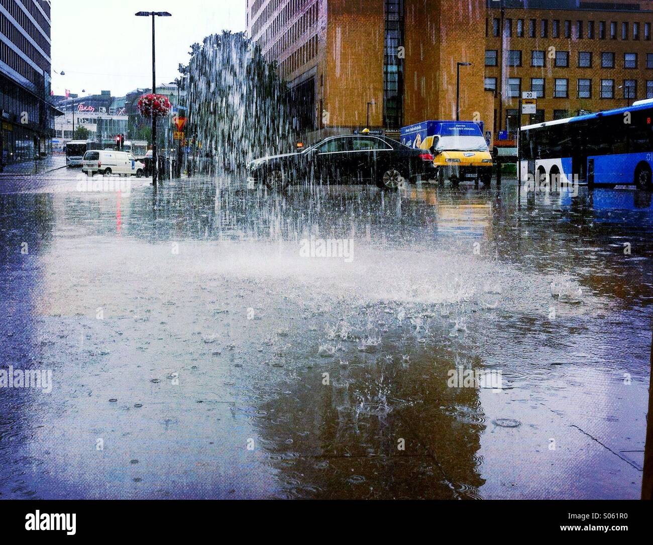 Heavy Rain in down town Helsinki Foto Stock