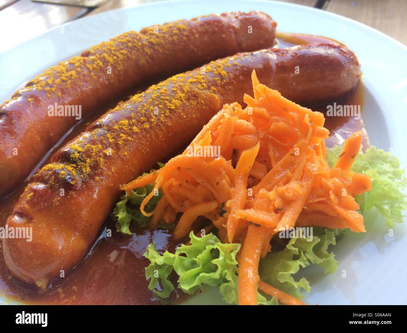 Currywurst, molto popolare di alimenti in Germania. Foto Stock