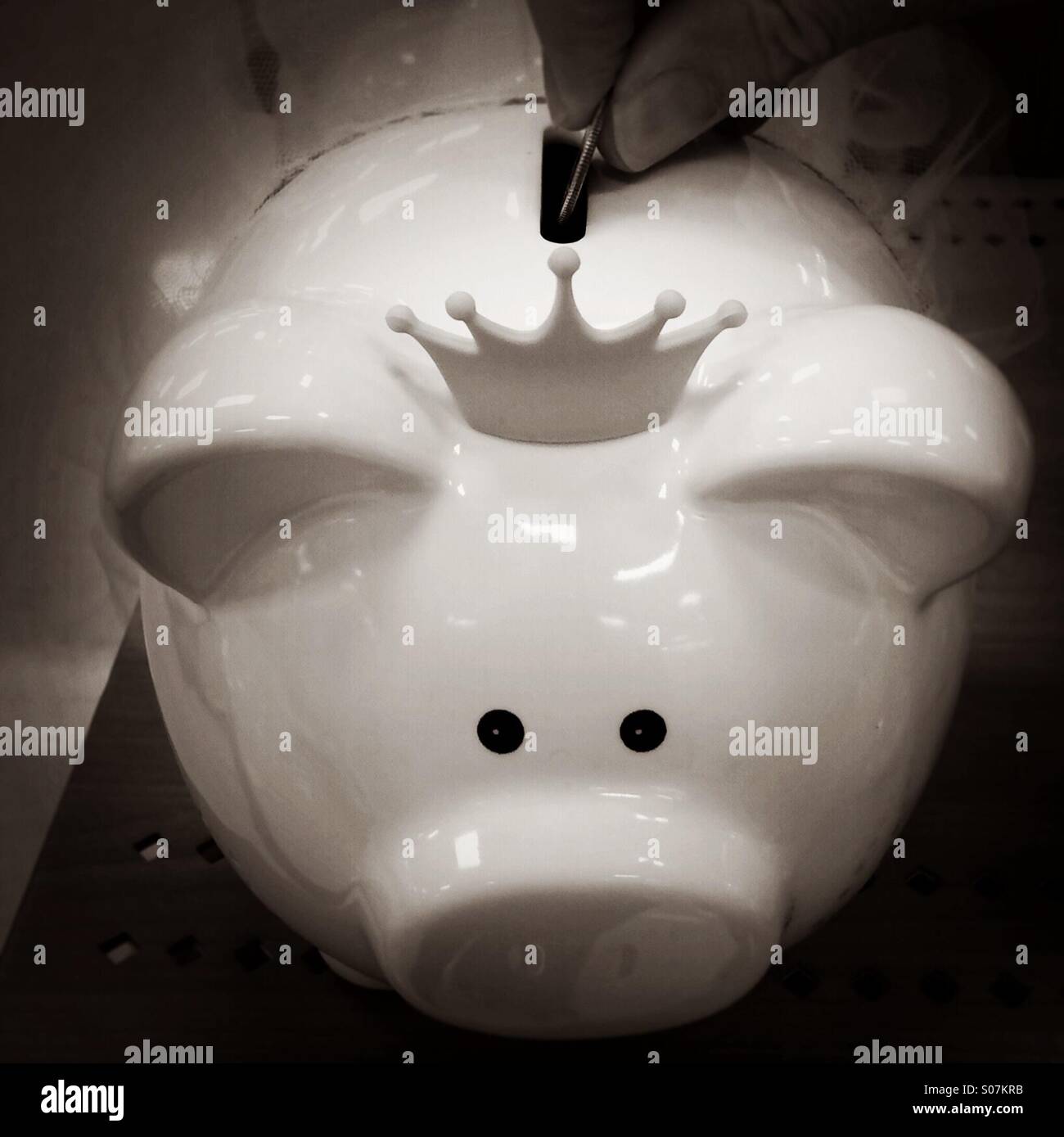 Il salvataggio di una principessa salvadanaio. Foto Stock