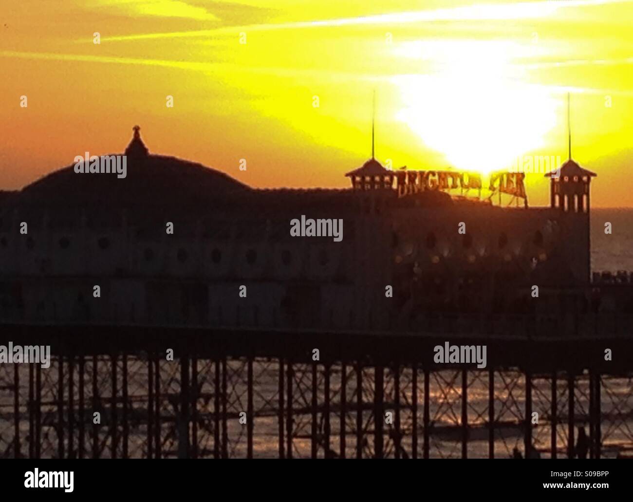 Il Brighton Pier al tramonto Foto Stock