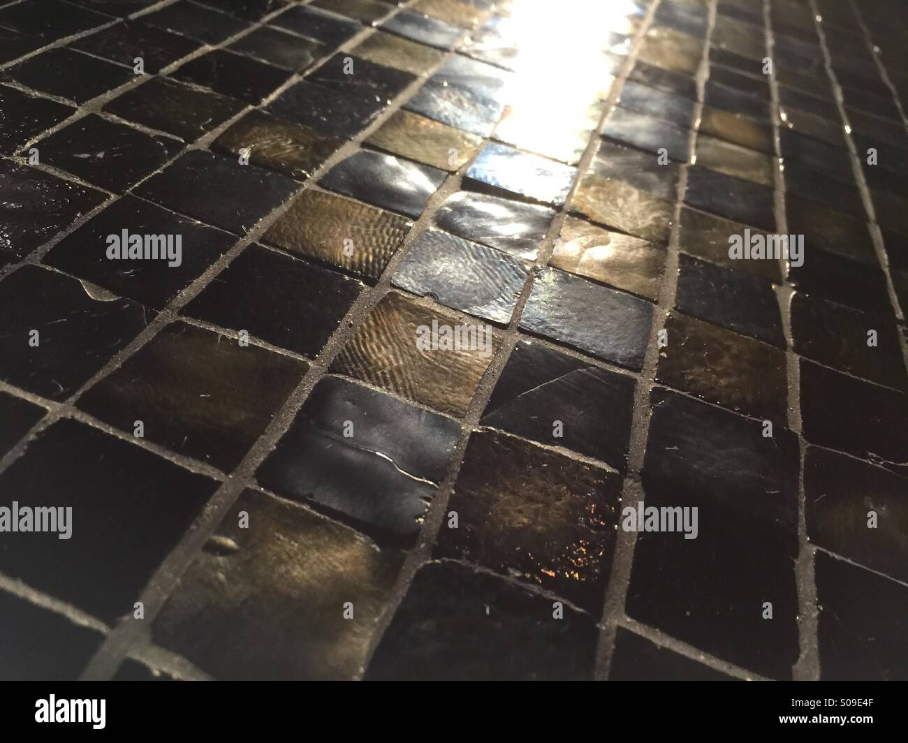 Nero e oro piastrella Foto Stock