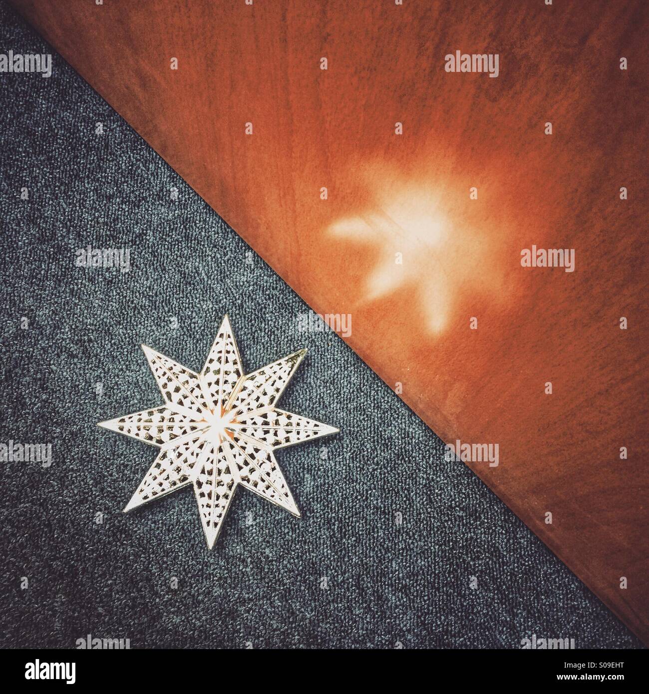 Una stella d'argento e di riflessione. Foto Stock