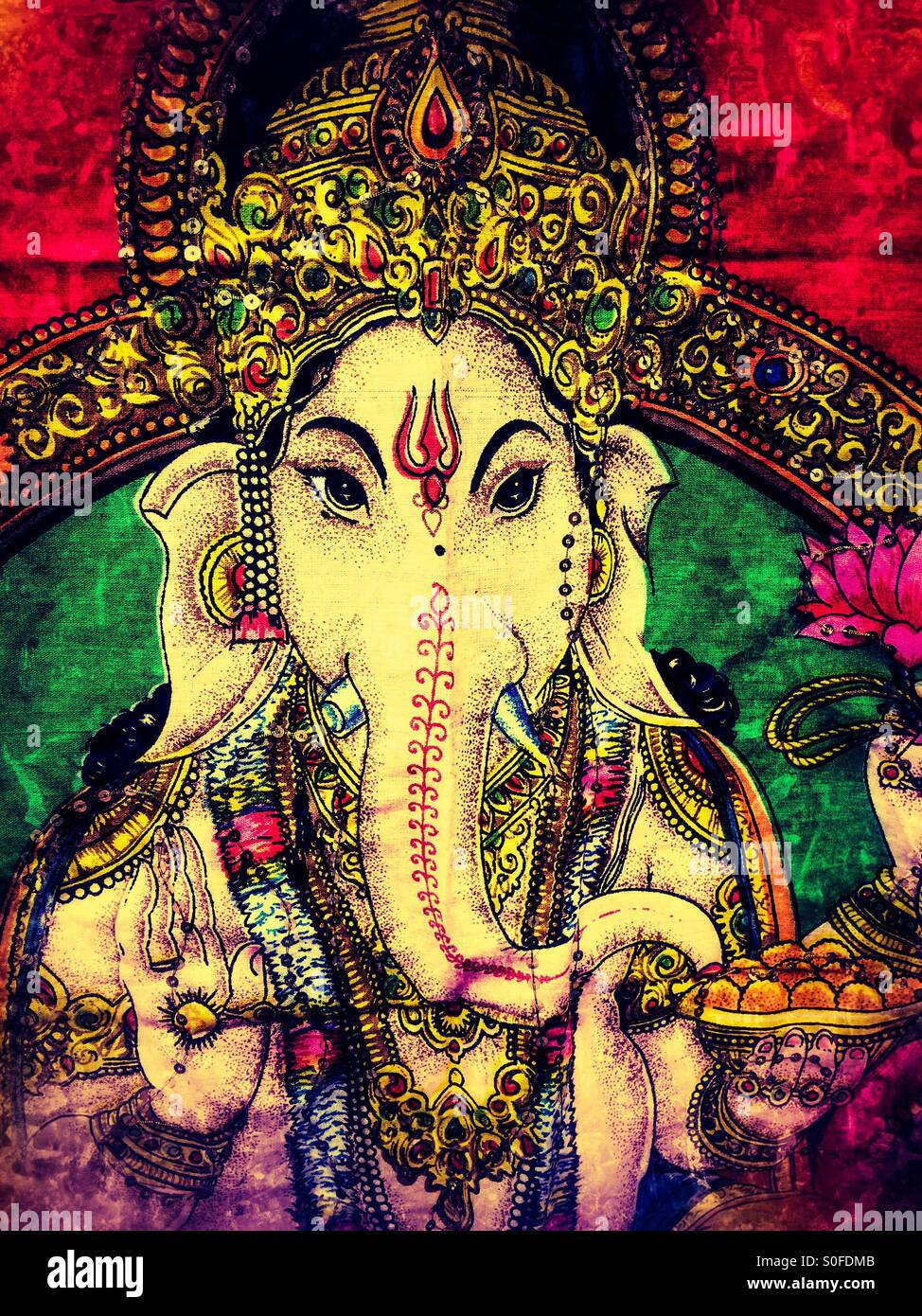 Ganesha, il dio indù della sapienza tessuto da parete - Immagine stock catturata con smartphone