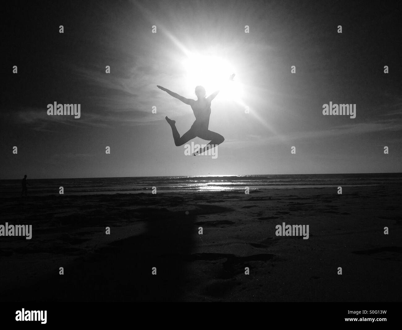 Silhouette di salto Foto Stock