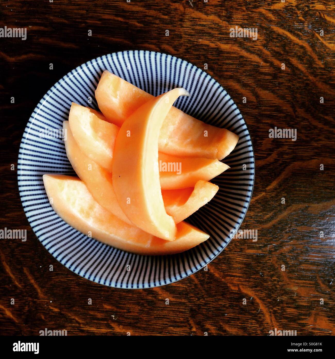 Cantelope fette di melone Foto Stock