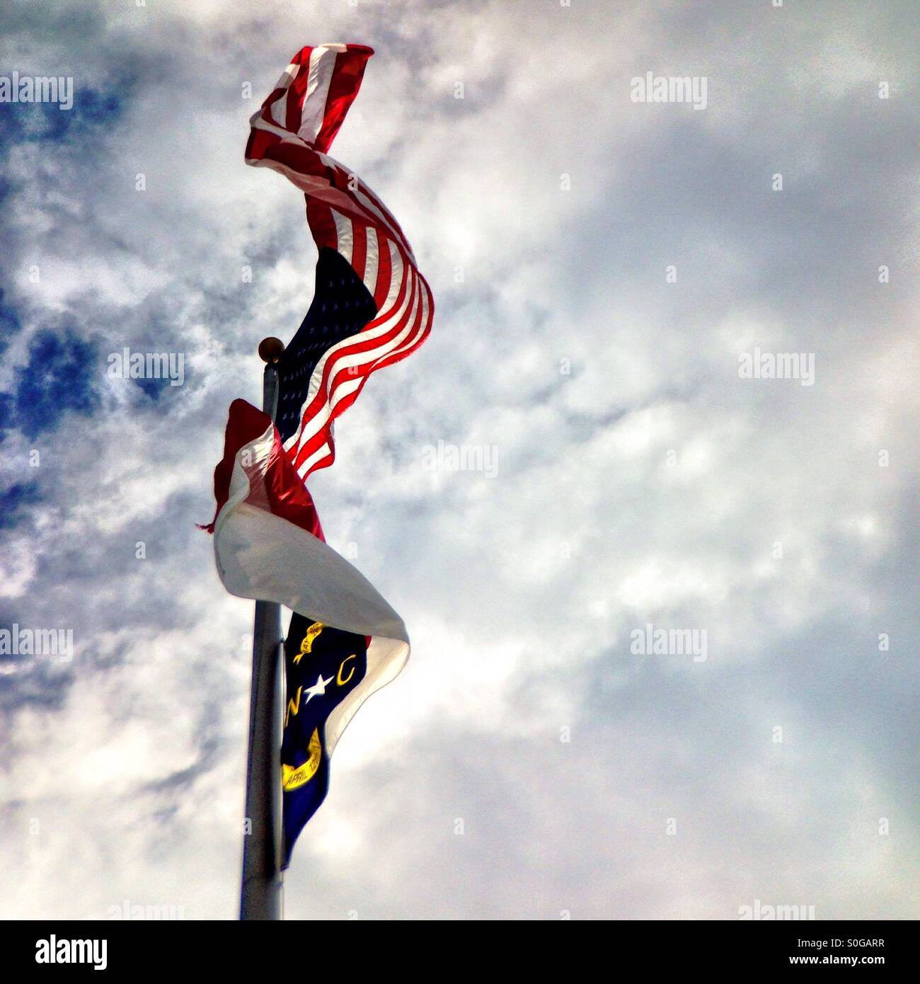 Bandiere di Stati Uniti e NC - Immagine stock catturata con smartphone