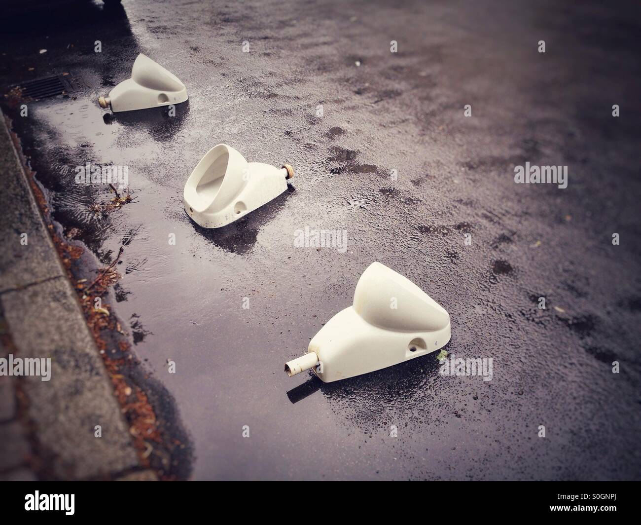 Orinatoi in strada Foto Stock