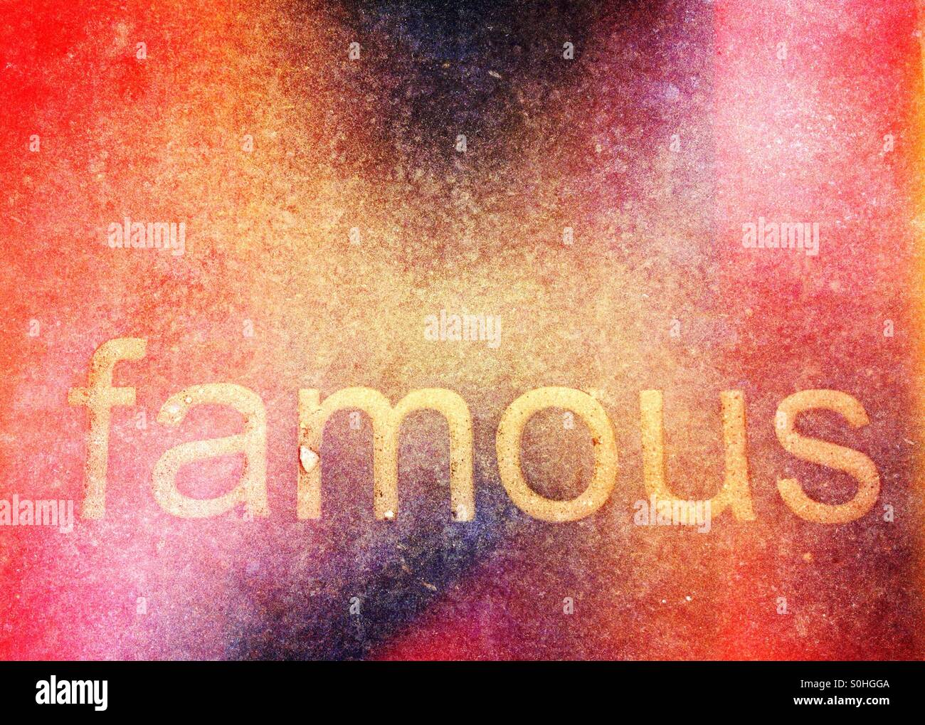 La parola famoso su una pavimentazione in pietra - Immagine stock catturata con smartphone