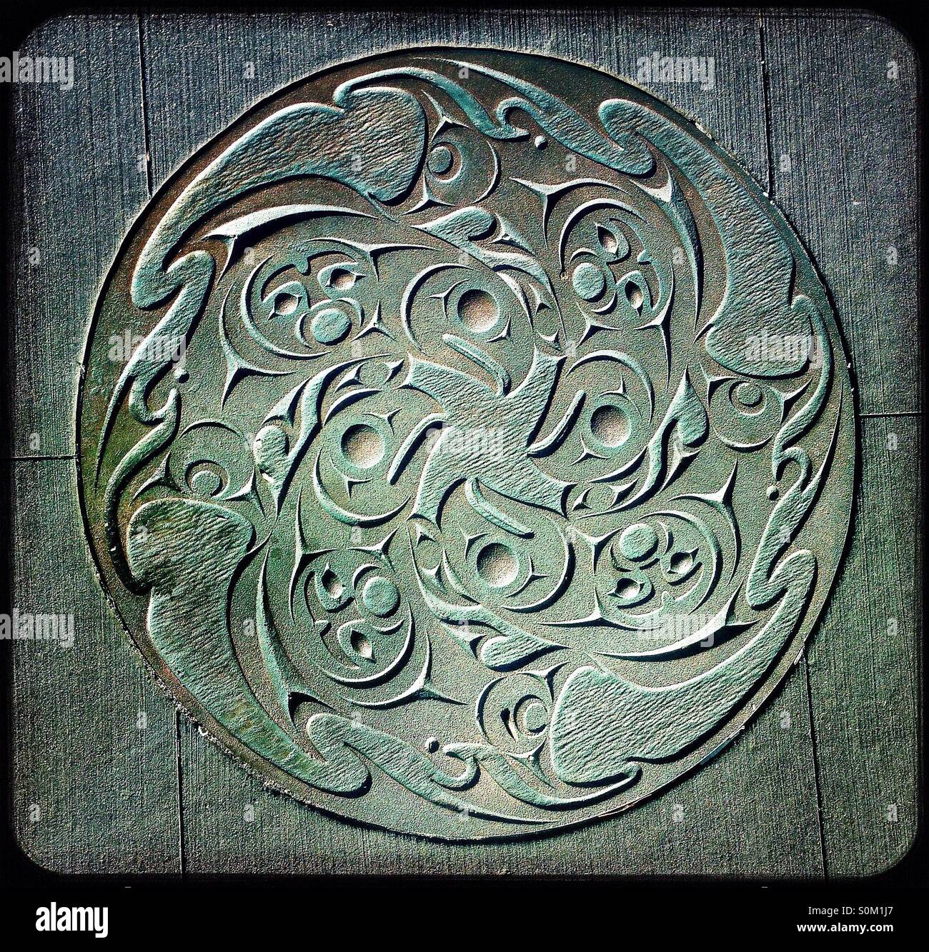 Nativo di illustrazioni canadese nelle strade di Vancouver - Immagine stock catturata con smartphone