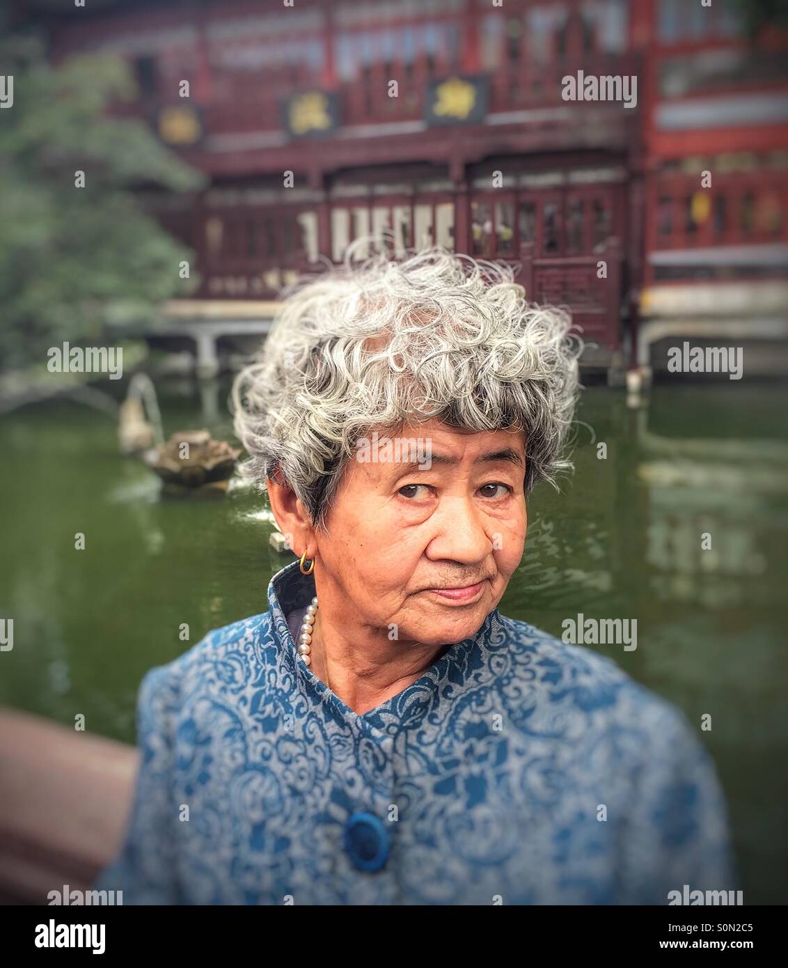 Anziani donna cinese Foto Stock