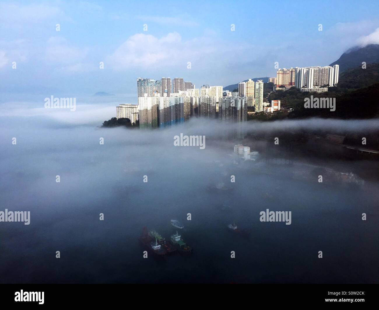 La nebbia meteo in Hong Kong. Foto Stock